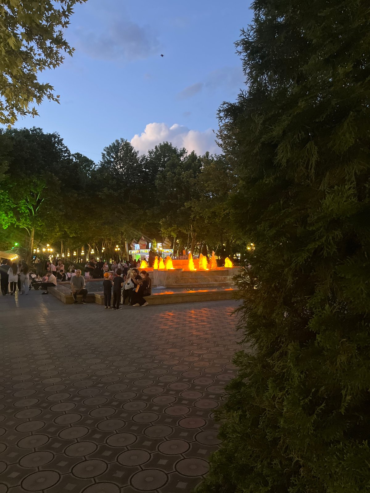 Yerevan's Republic Square fountain lit up at dusk