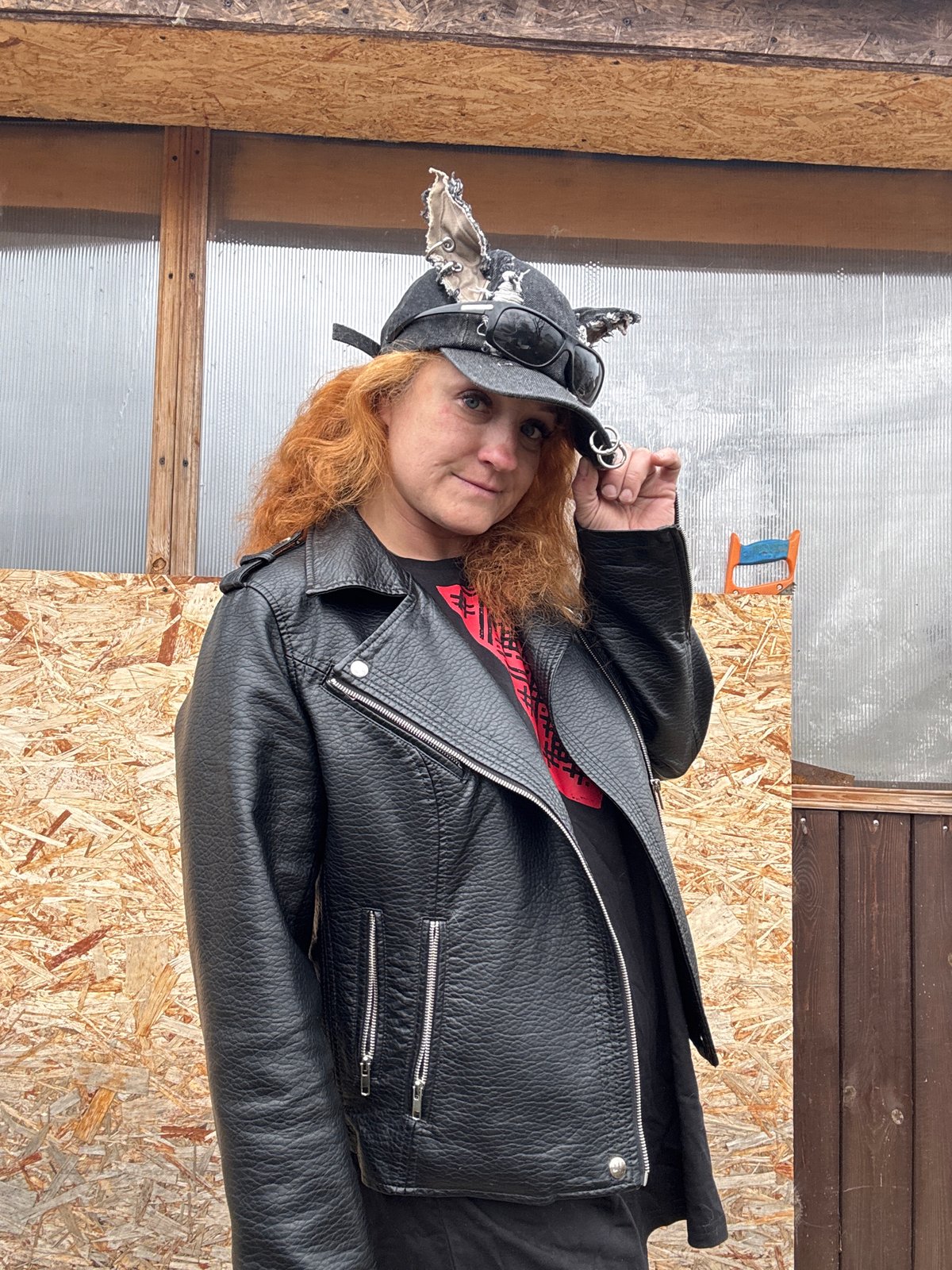 Woman with chainsaw photographed multiple times in Chaikovsky, Russia