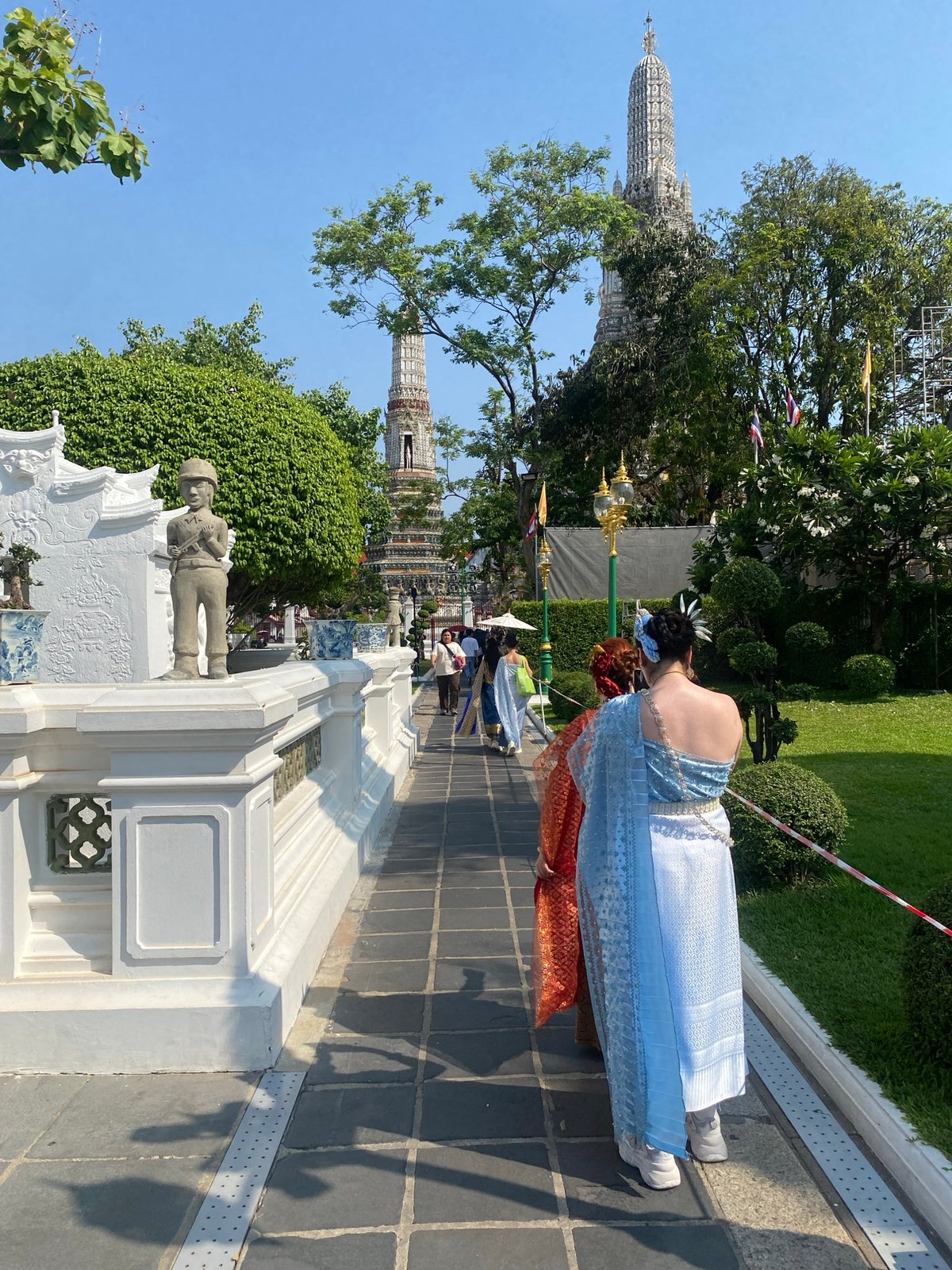 Traditional dress, temple visits documented at Bangkok's Wat Arun
