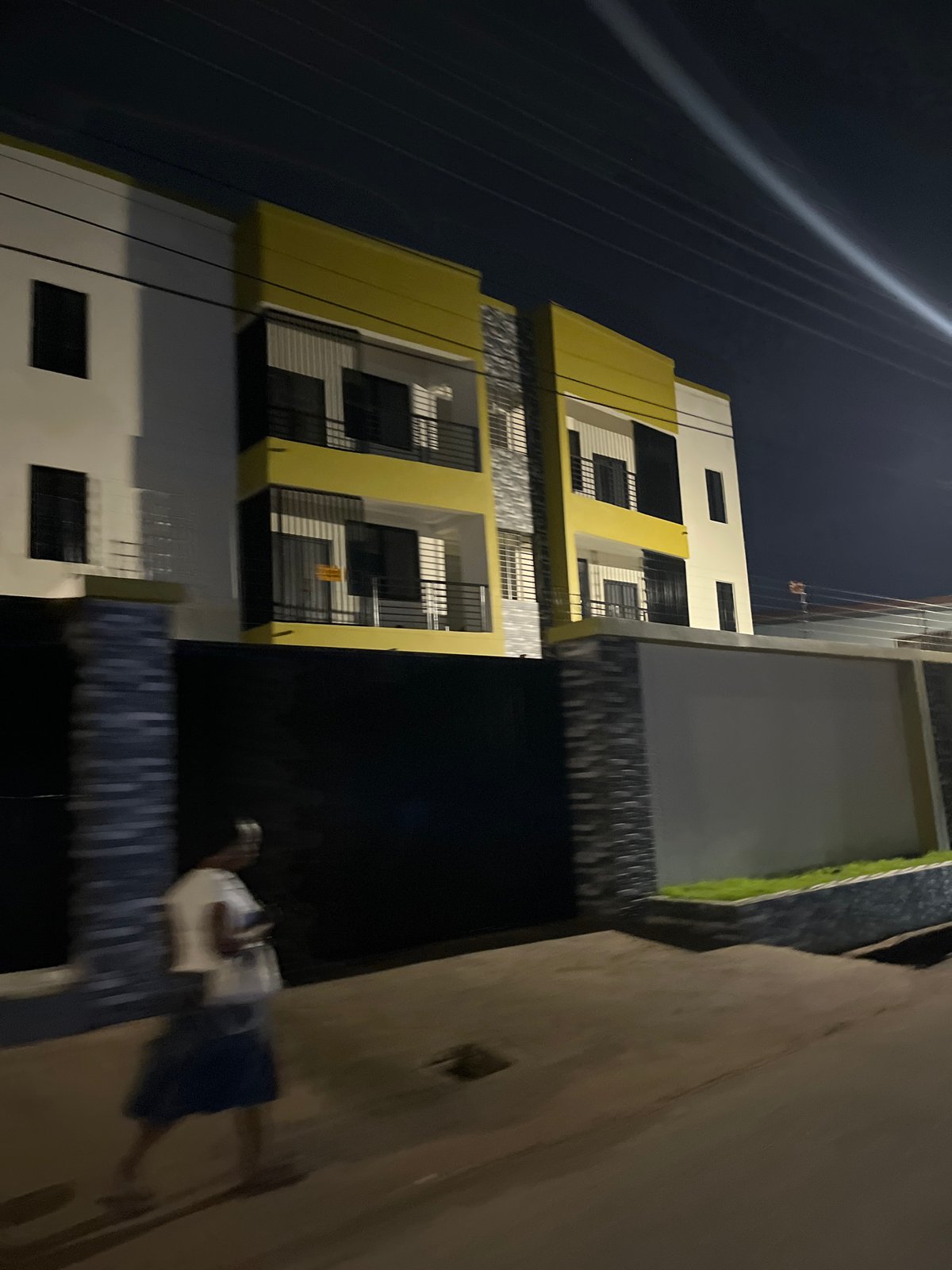 Nighttime residential building documented in Accra, Ghana