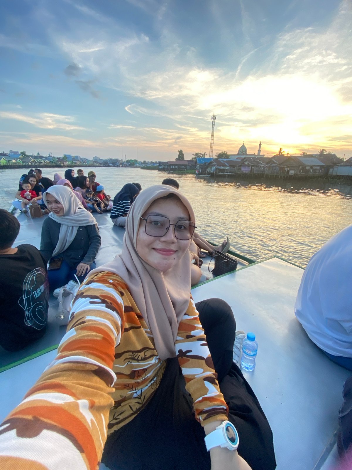 Sunset boat ride along Banjarmasin's Martapura River
