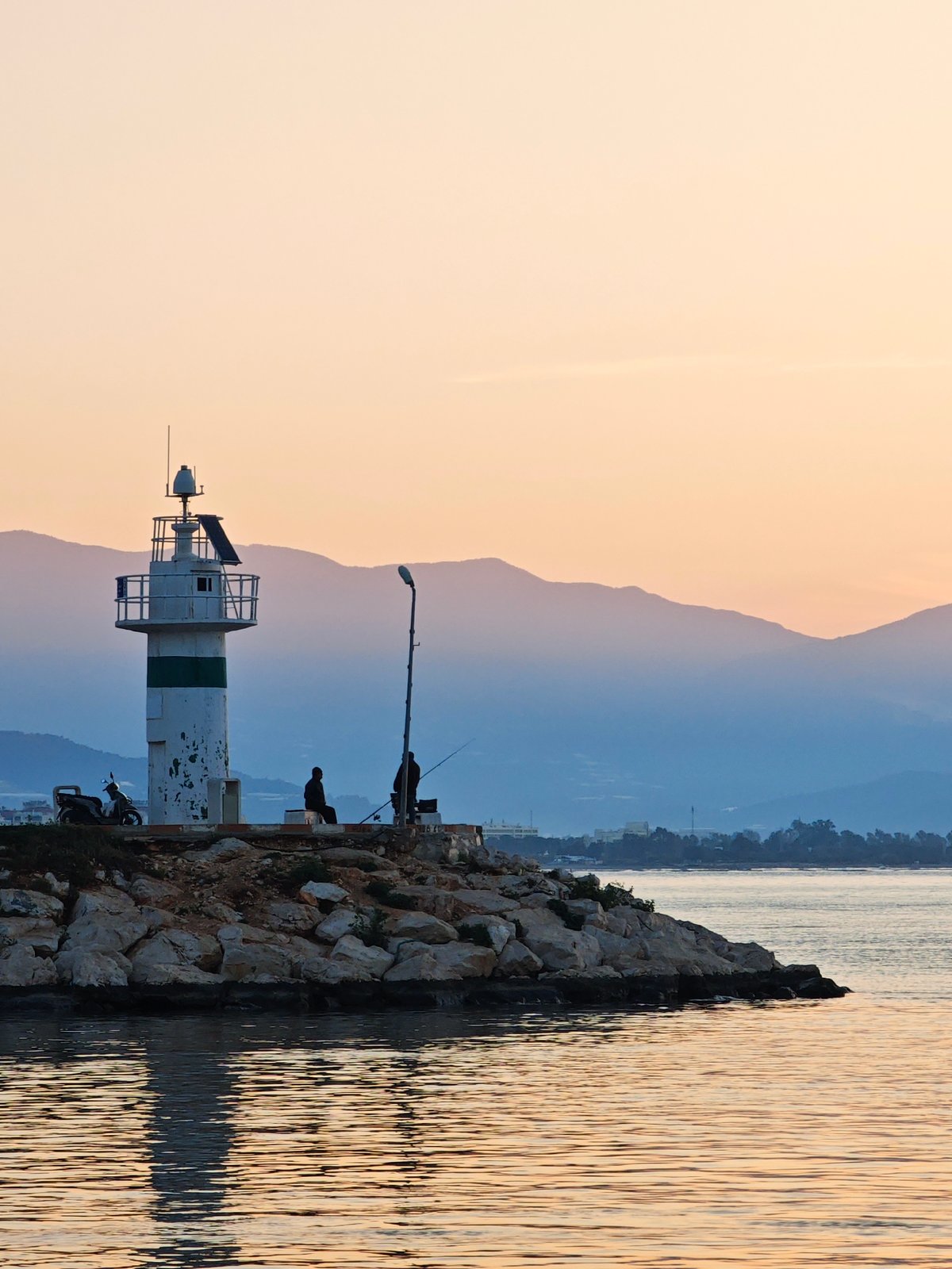 Dawn lighthouse scene captured along Finike's Mediterranean coast
