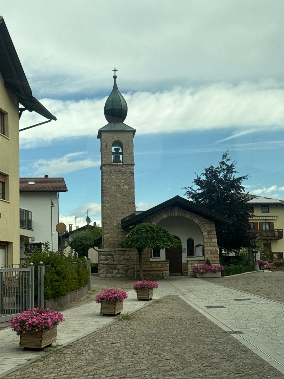 Strolling the flower-lined streets of Fai della Paganella
