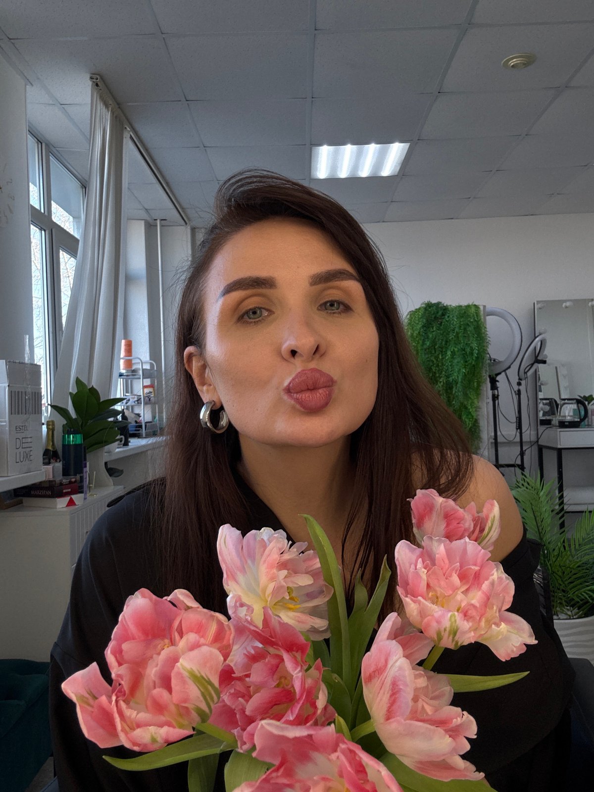 Hair salon visit with pink styling and flowers in Chaikovsky