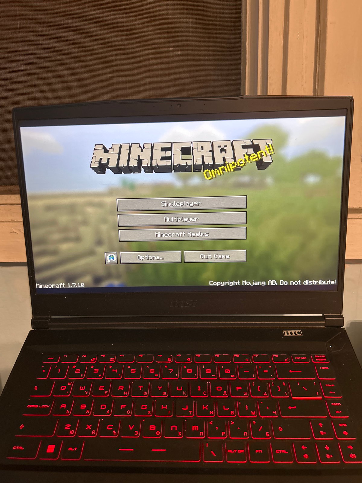 Someone preparing to play Minecraft 1.7.10 on laptop setup