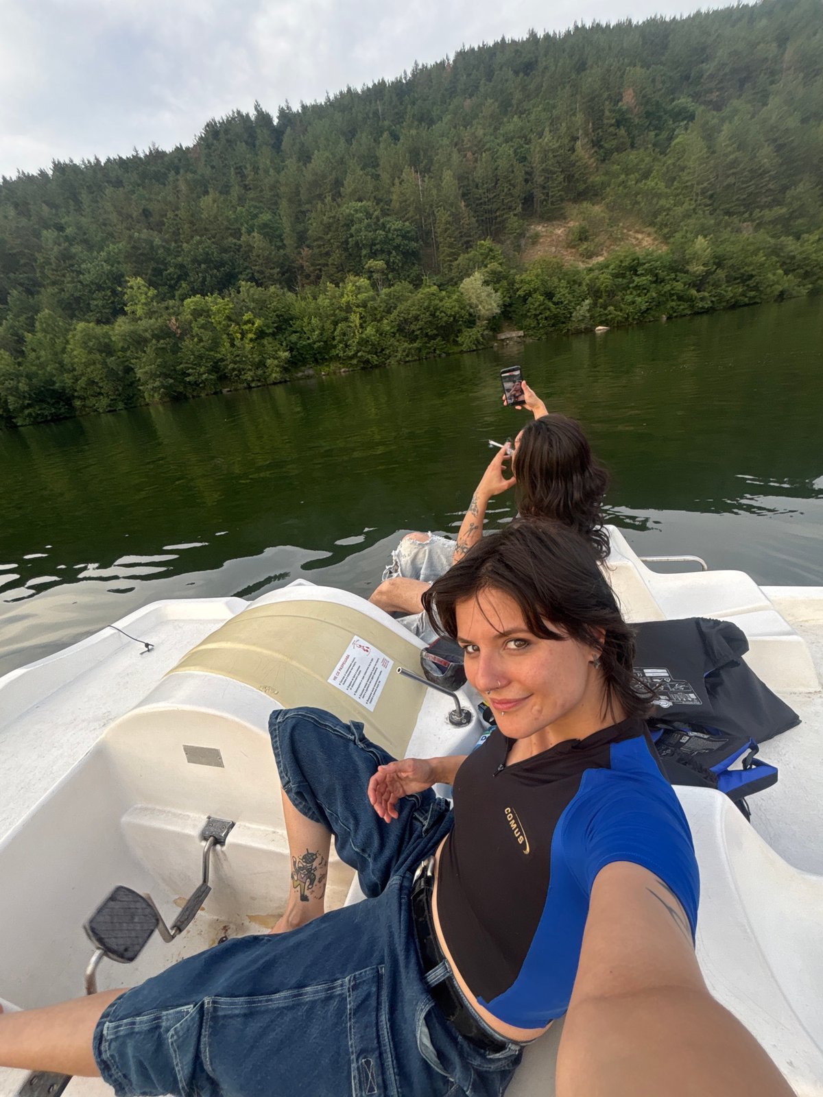 Pedal boat afternoon on Lake Pancharevo at golden hour