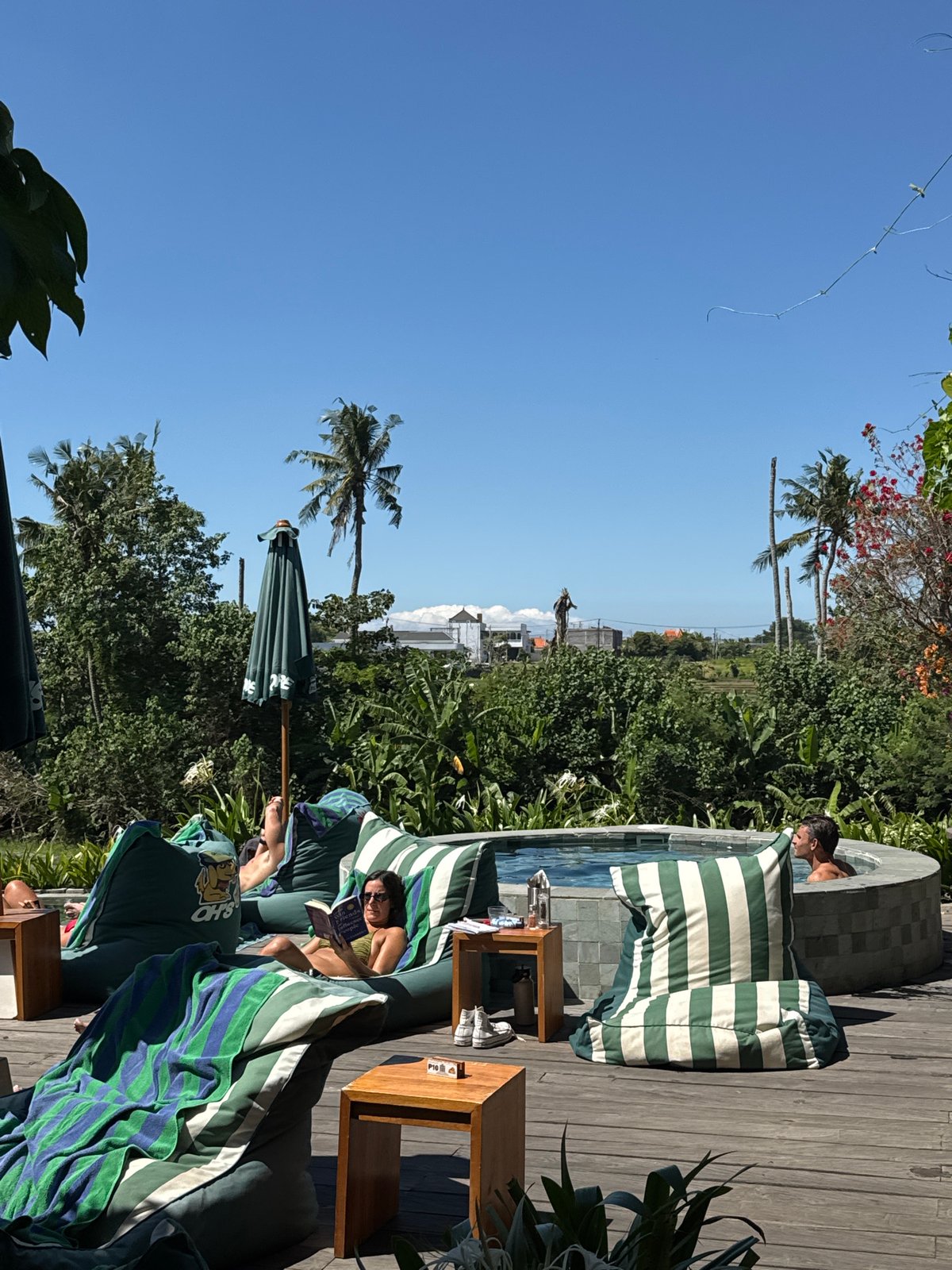 Resort guests enjoy morning pool activities in Mengwi