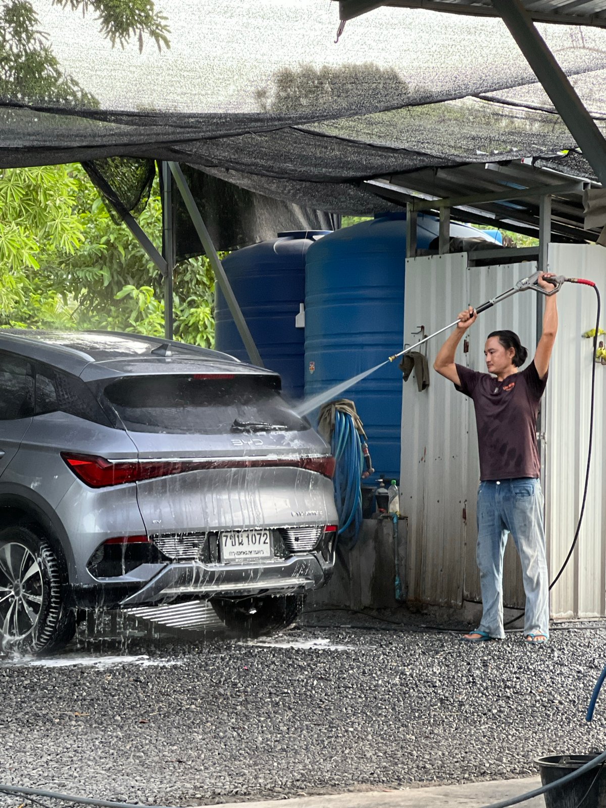 Full-service car wash in action at Ban Bang Rak, Samui