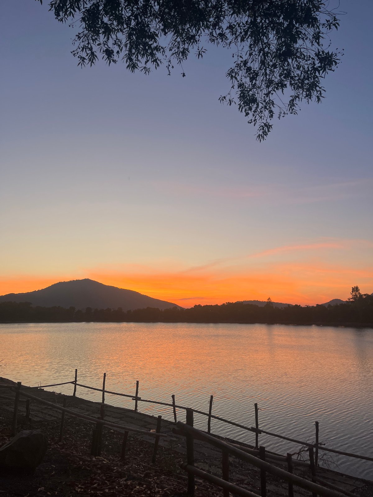 Peaceful sunrise captured over water in Baan Harn, Thailand