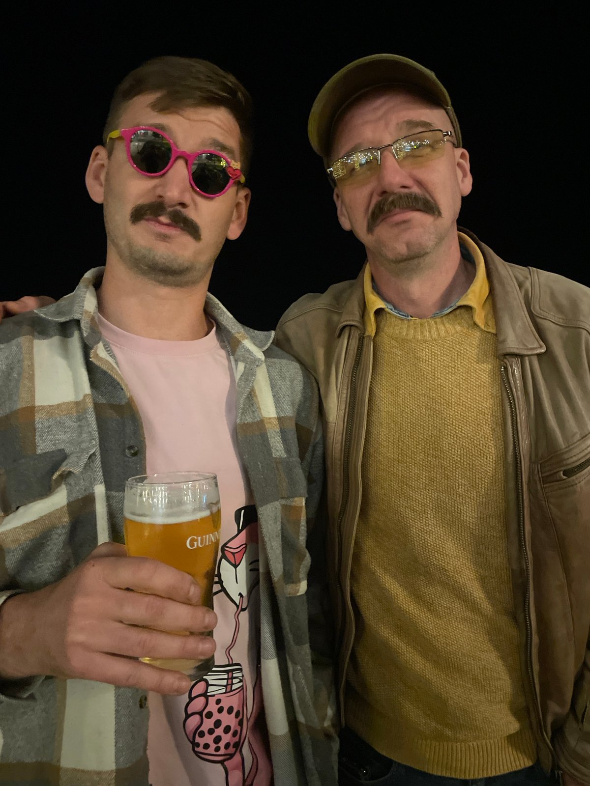 Two friends pose for photos during evening in Rafailovići