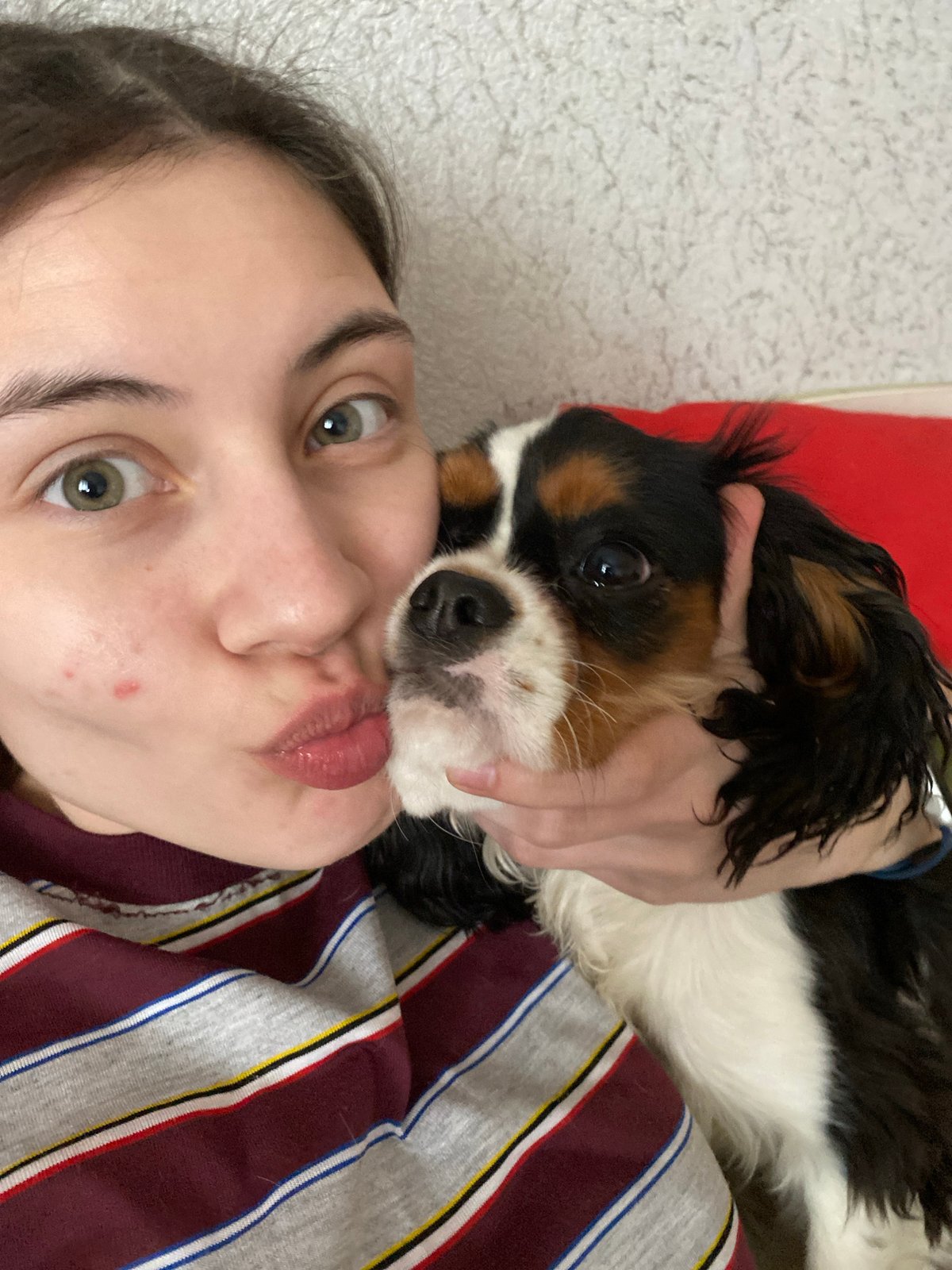 Woman and dog share quiet morning moment in Votkinsk
