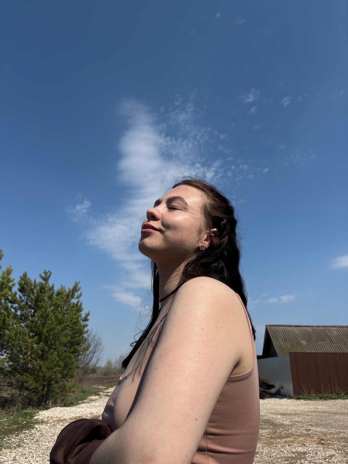Portrait photographed outdoors in Zaosinovo on sunny spring day