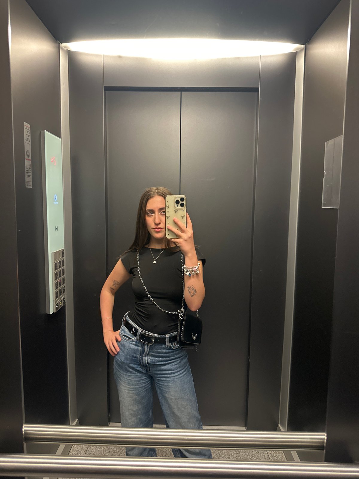 Woman takes selfie in elevator in Huixquilucan, Mexico