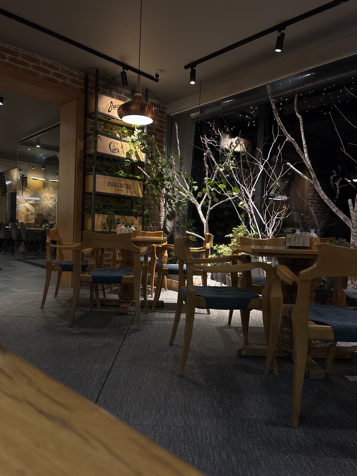 Restaurant interior with stacked chairs documented in Bansko, Bulgaria