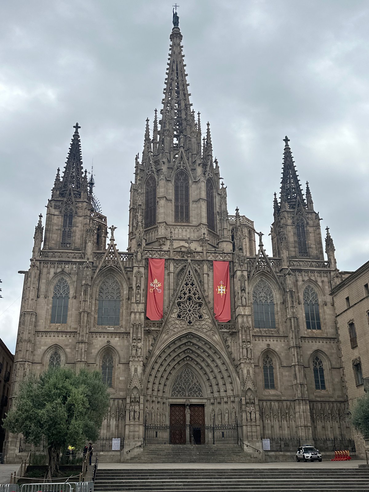 Tourist documents Barcelona's historic center during morning walkabout