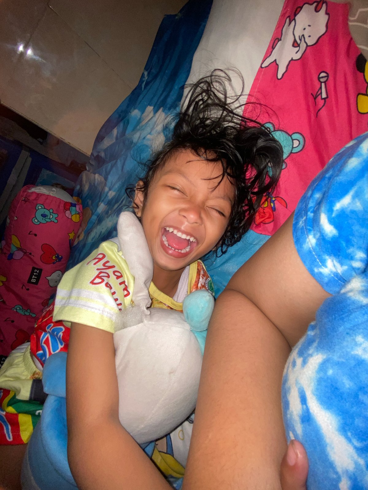 Child's joyful moments captured in Gelam, Indonesia