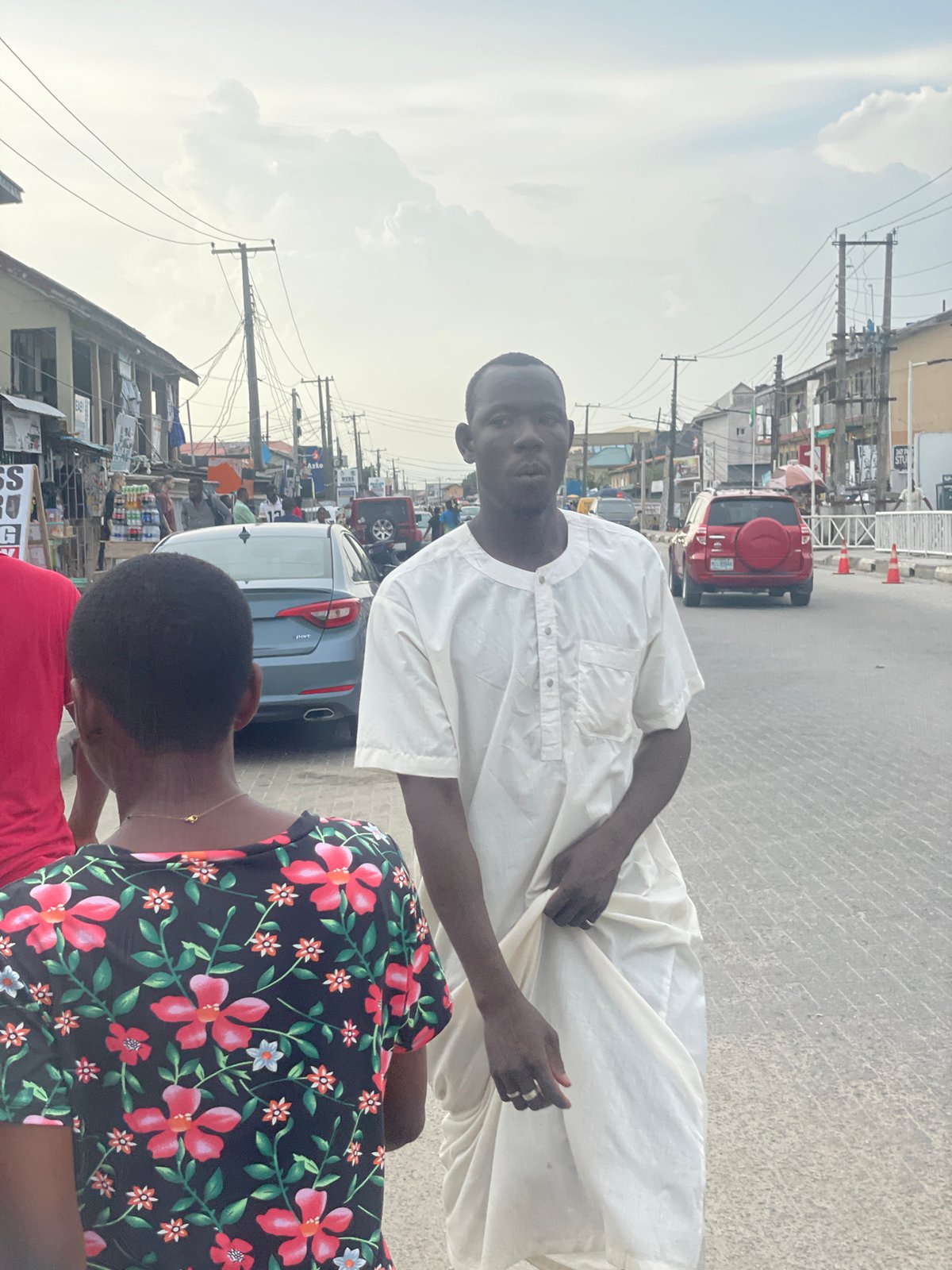 Daily street life documented in Ado, Nigeria commercial district