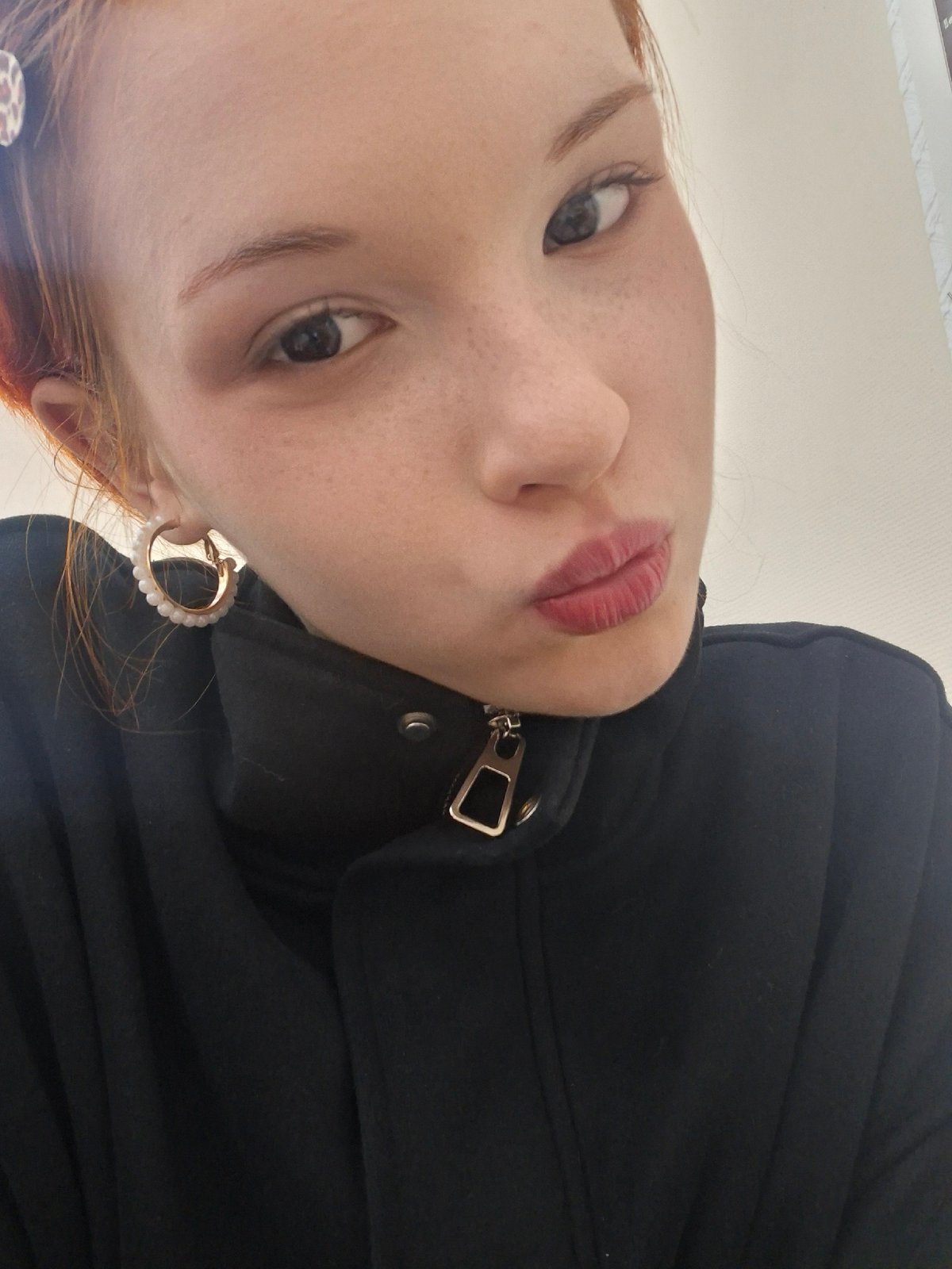 Portrait photos captured in Chaikovsky, Russia show freckled youth