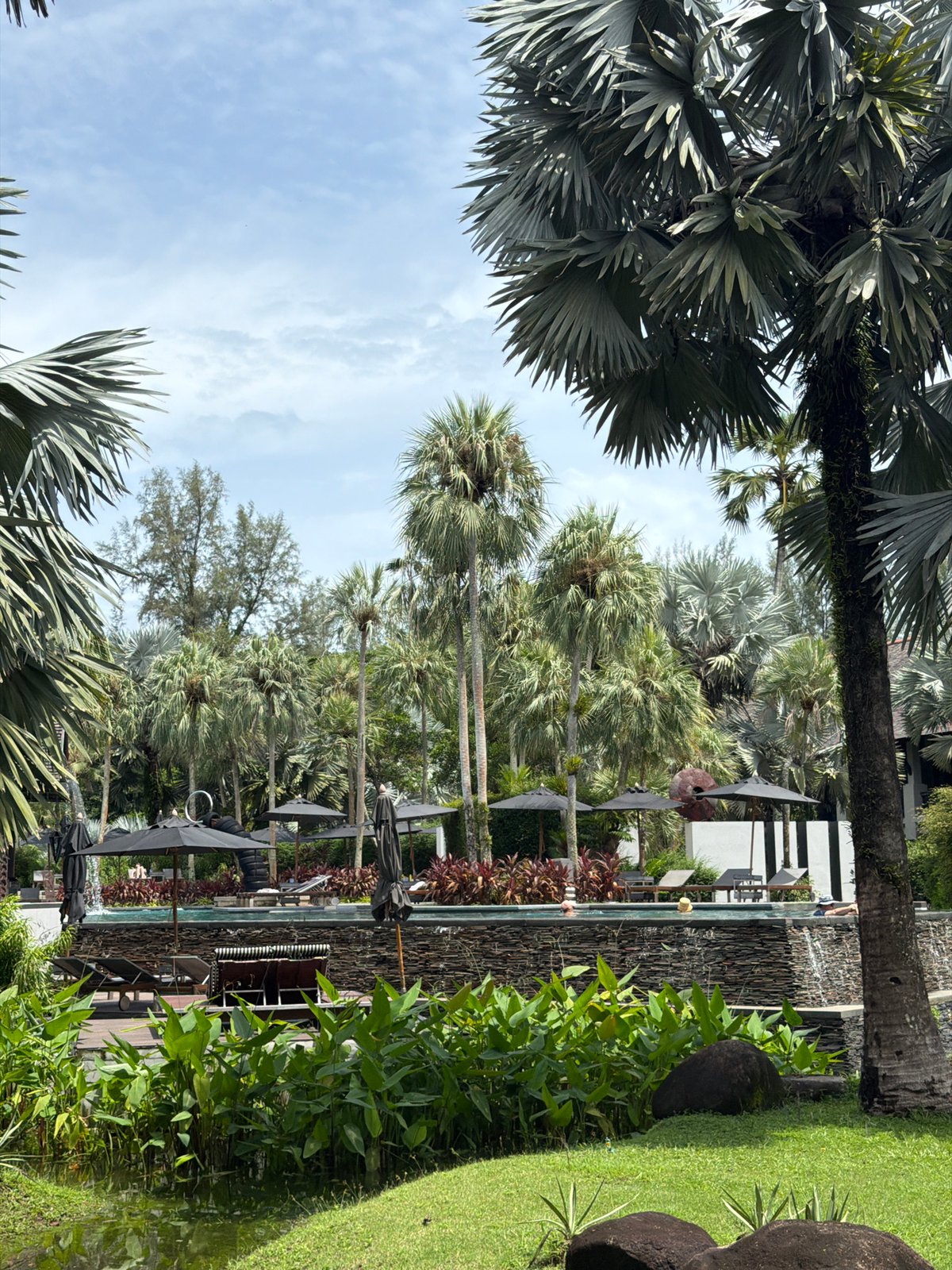 Morning beer break at Thai resort poolside