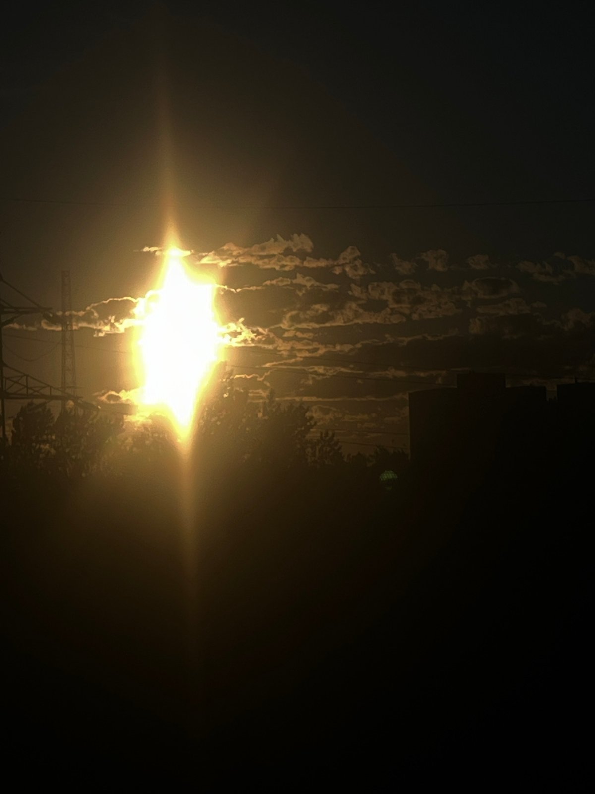 Golden hour fades over Petro-Slavyanka's rooftops and power lines