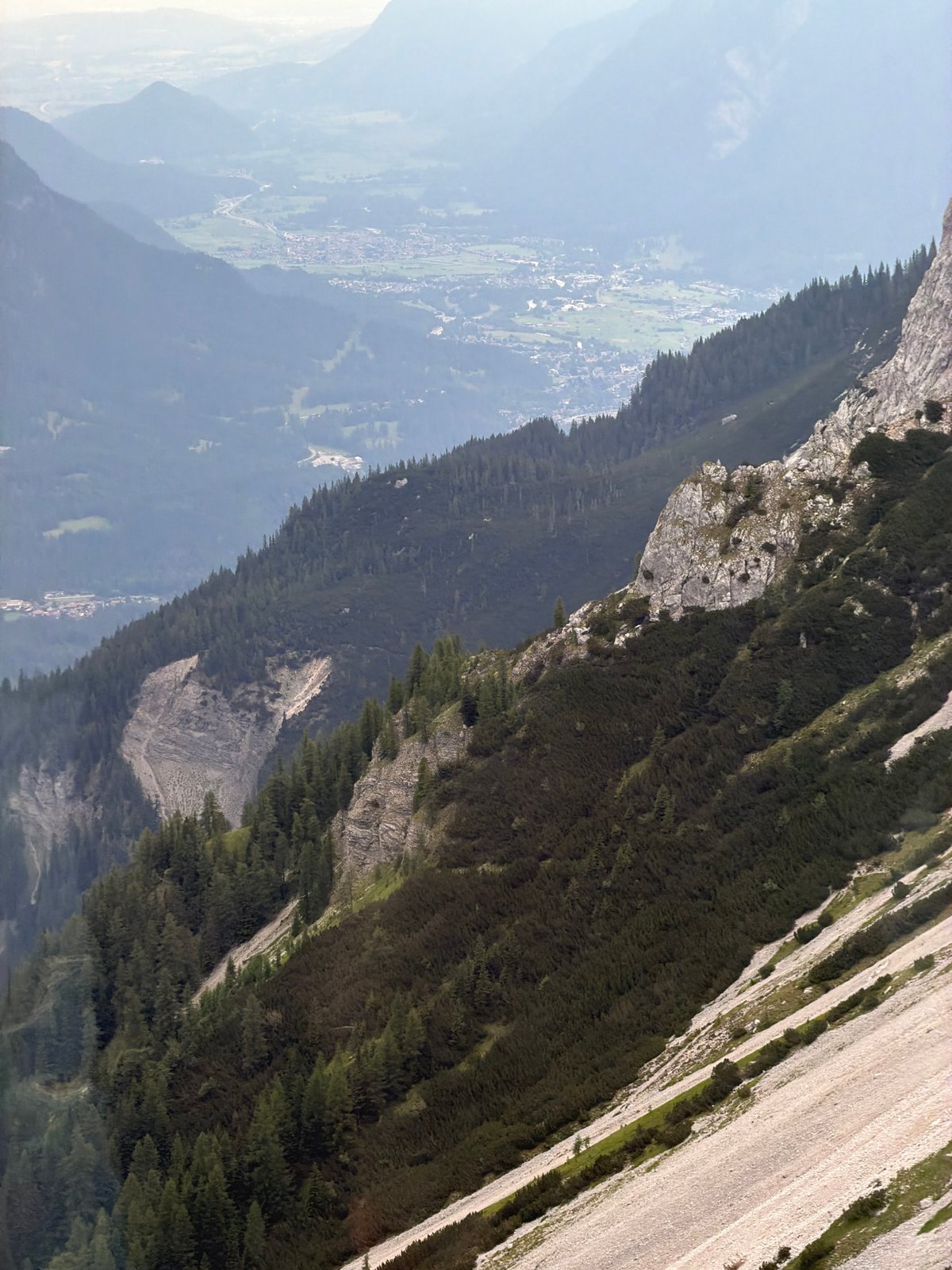High-altitude views over the Grainau valley and rocky Alpine faces