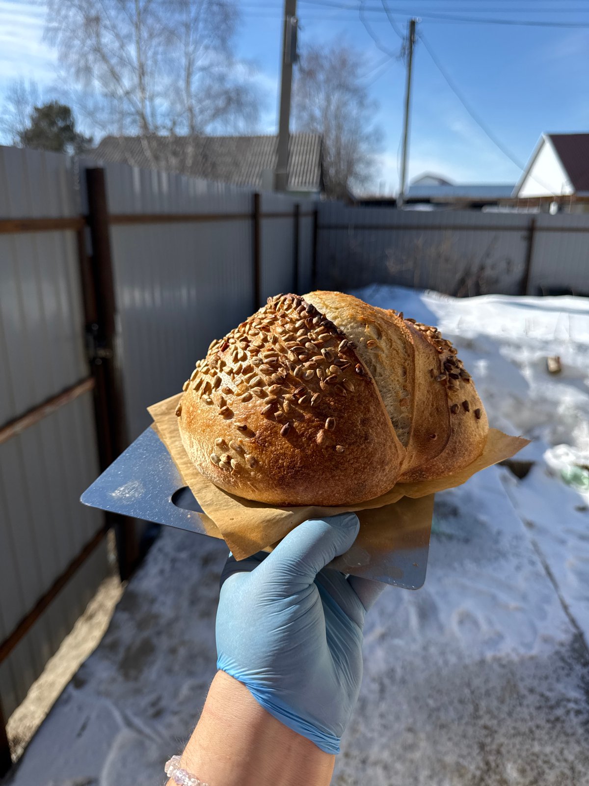 Home bread baking documented in snowy Russian village