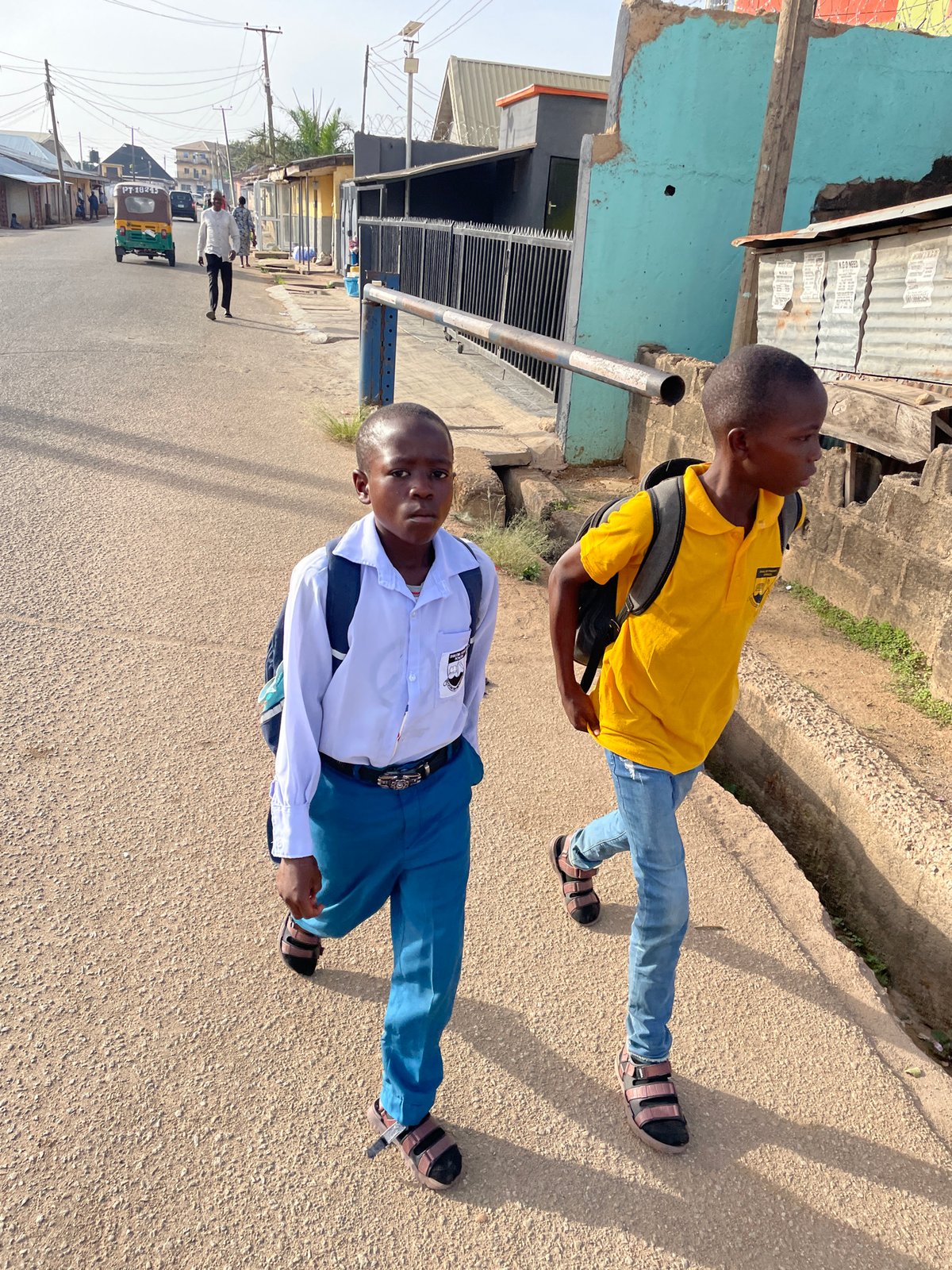 Children spotted on urban street during morning hours