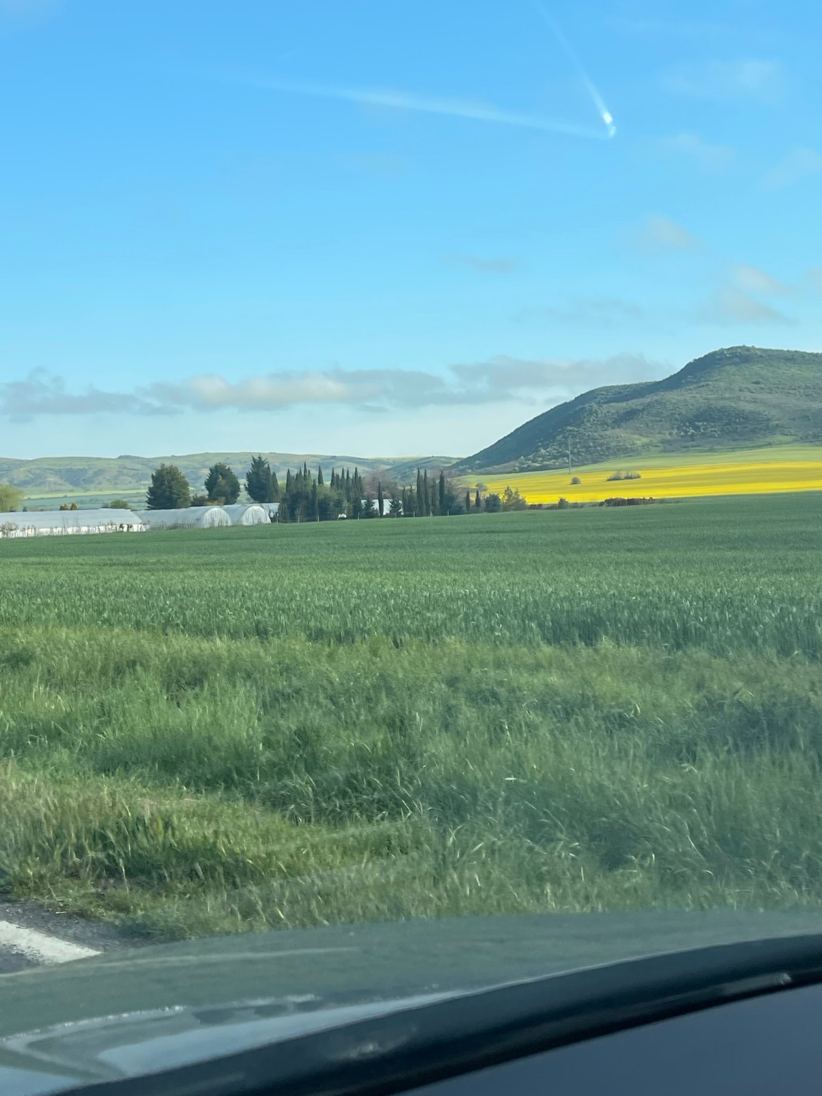 Morning countryside view captured from vehicle near Aytos, Bulgaria
