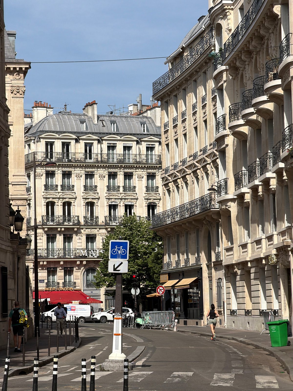 Morning walk through central Paris captures street architecture, café