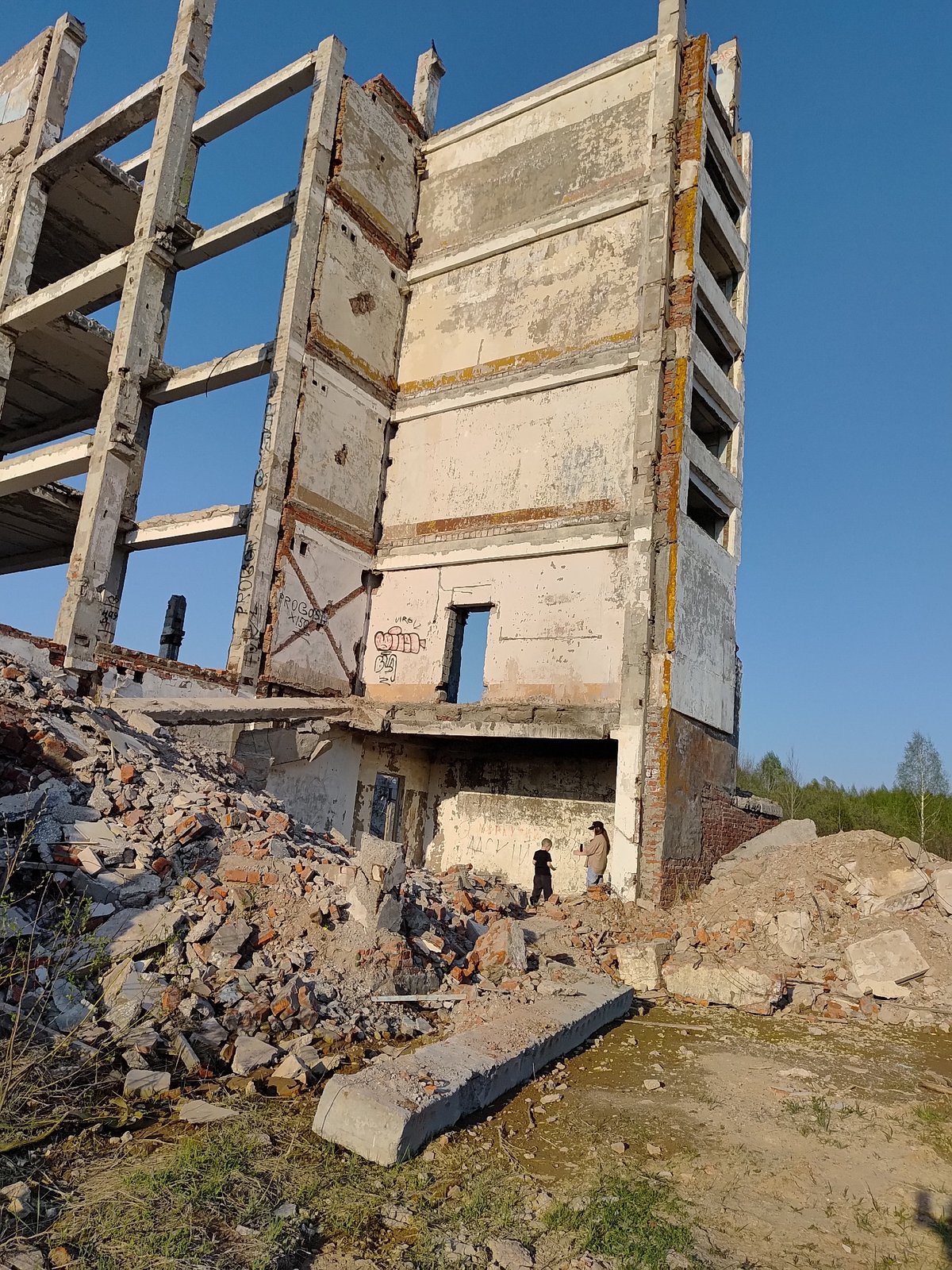 Visitors explore abandoned ruins in Марковский, Russia