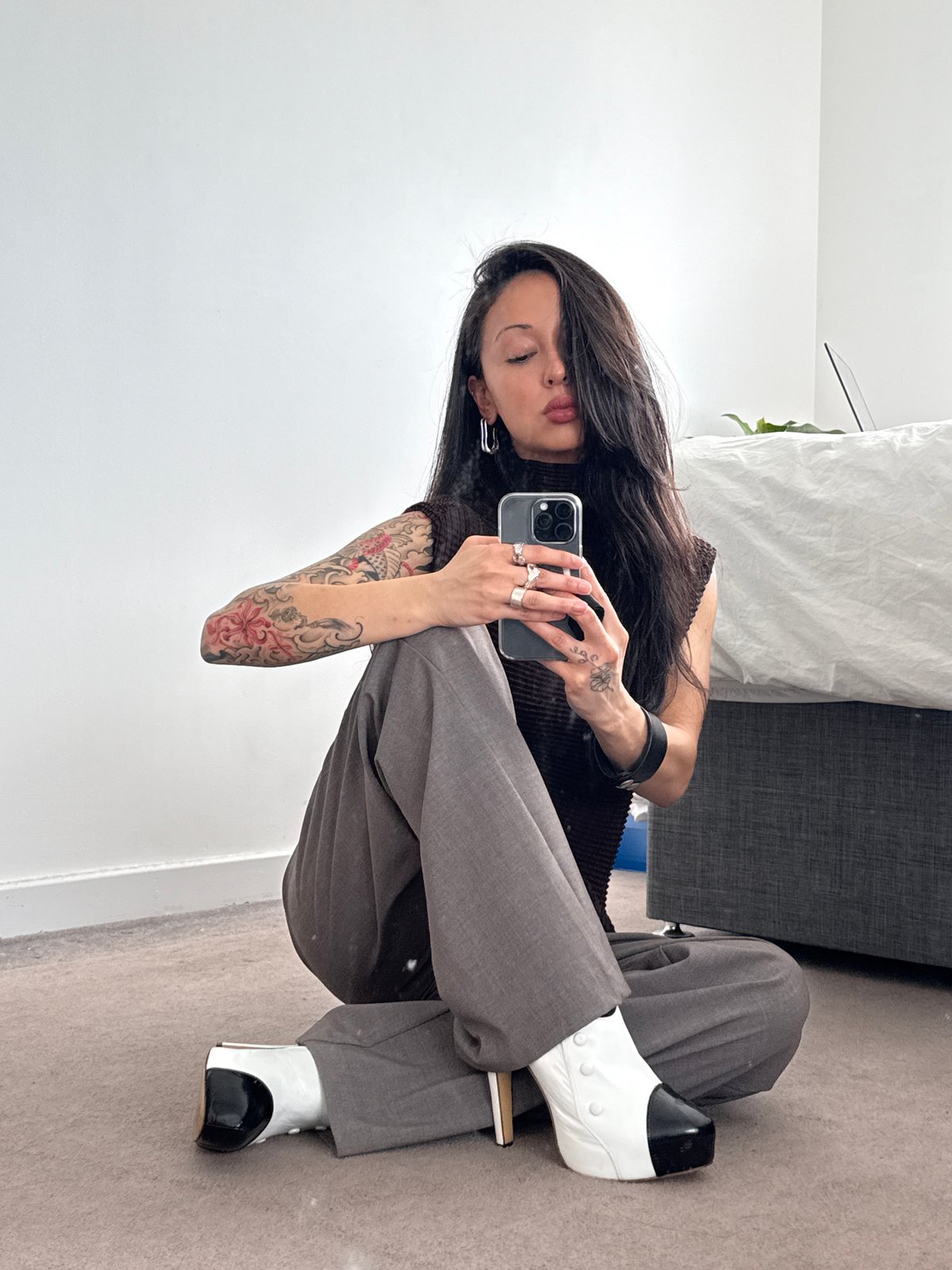 Person takes mirror selfie at London residence