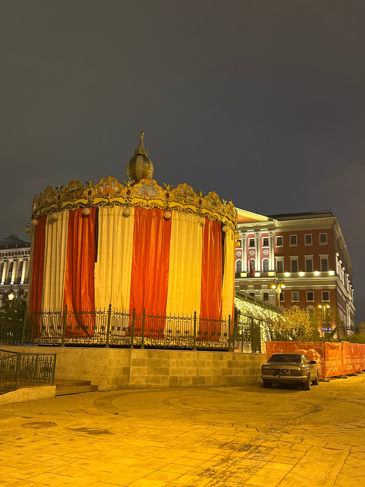Ornate carousel sits closed in Moscow evening