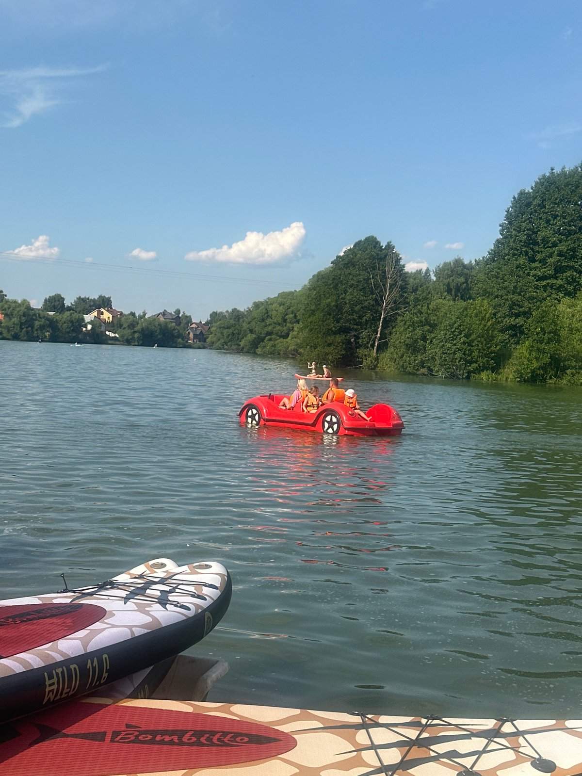 Summer afternoon at a Moscow-area lake beach resort