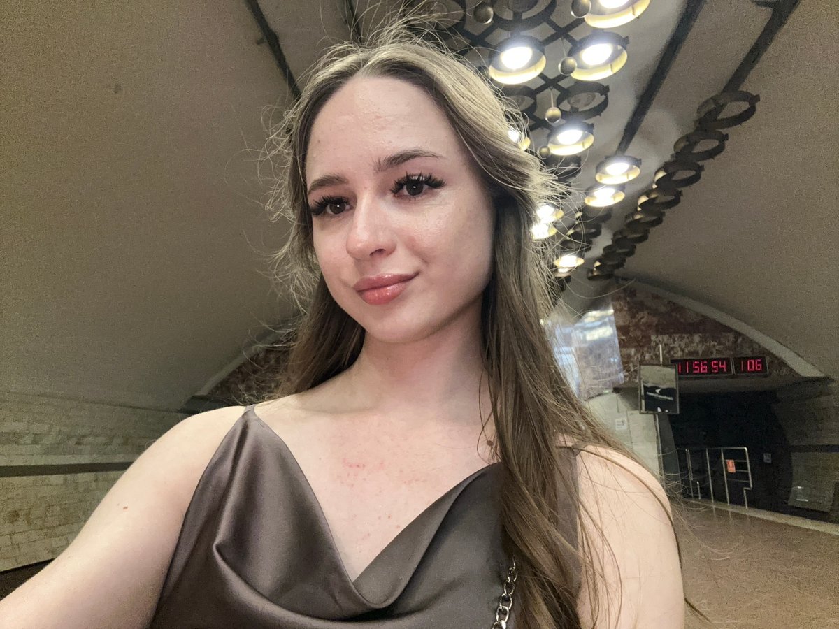 Selfie session moves from subway station to sunny city street