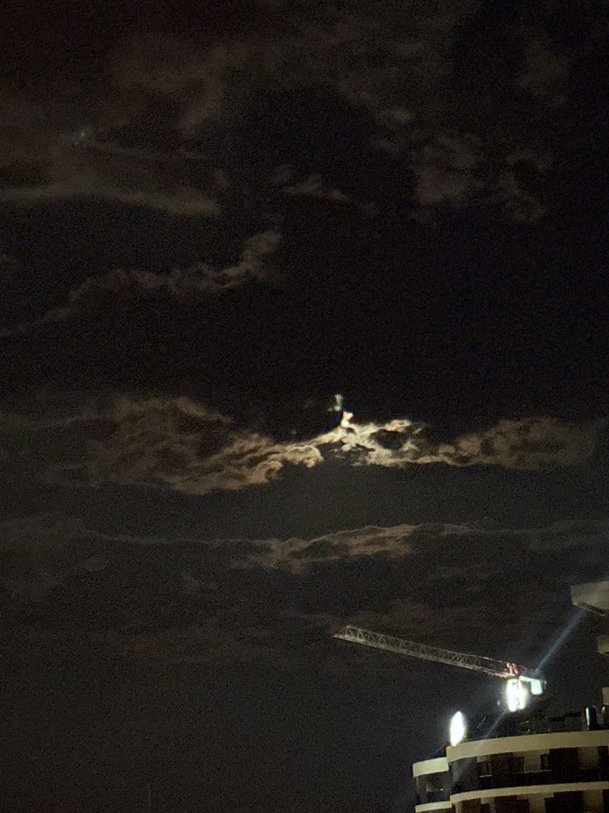 Rainy night in Boreti: cranes, wet streets, and a fire response