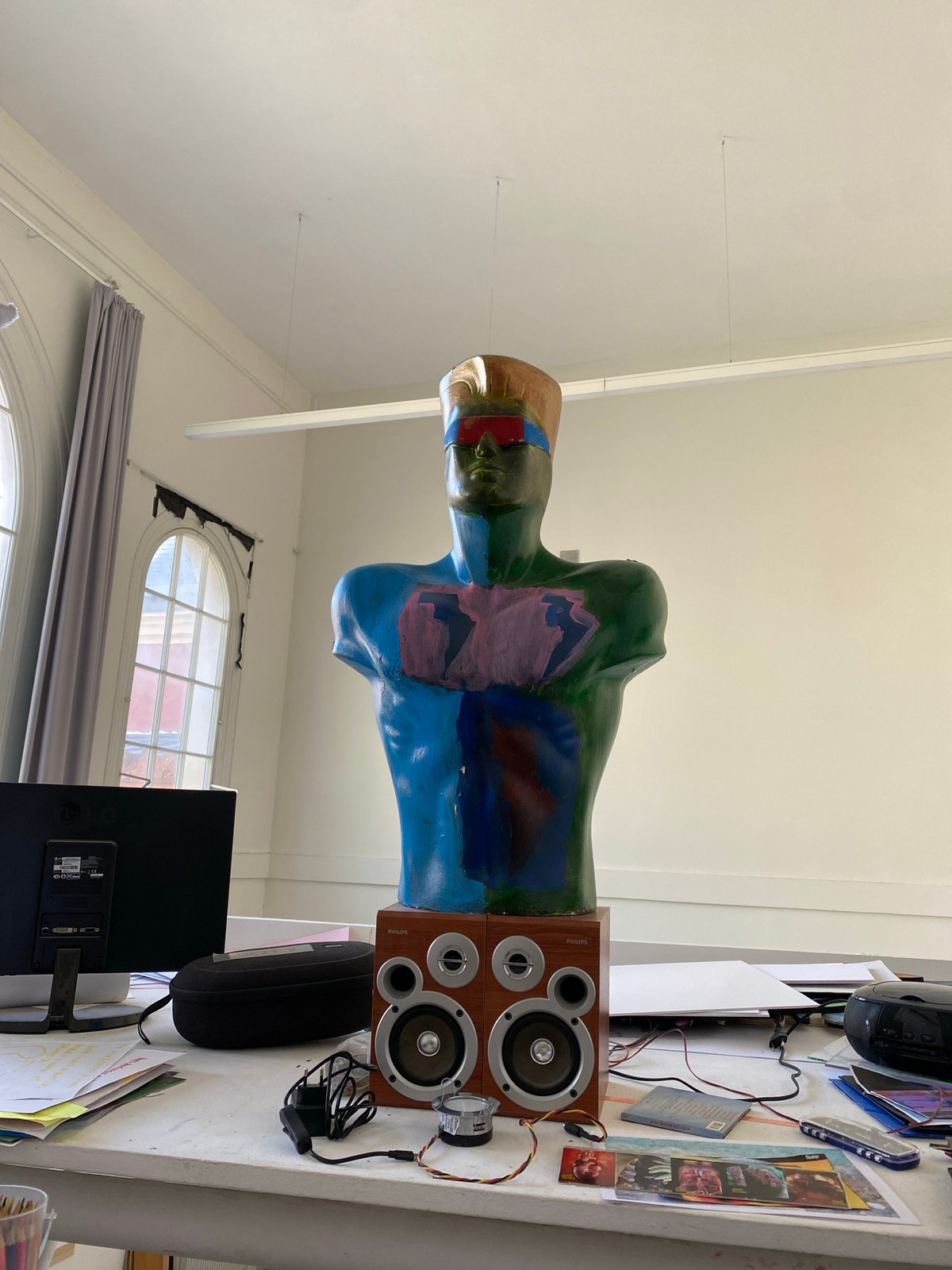 Anatomical model torso observed in Parisian interior room
