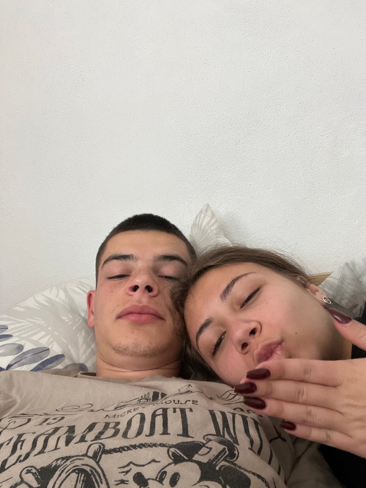 Couple photographed together on bedding in Karavelovo, Bulgaria
