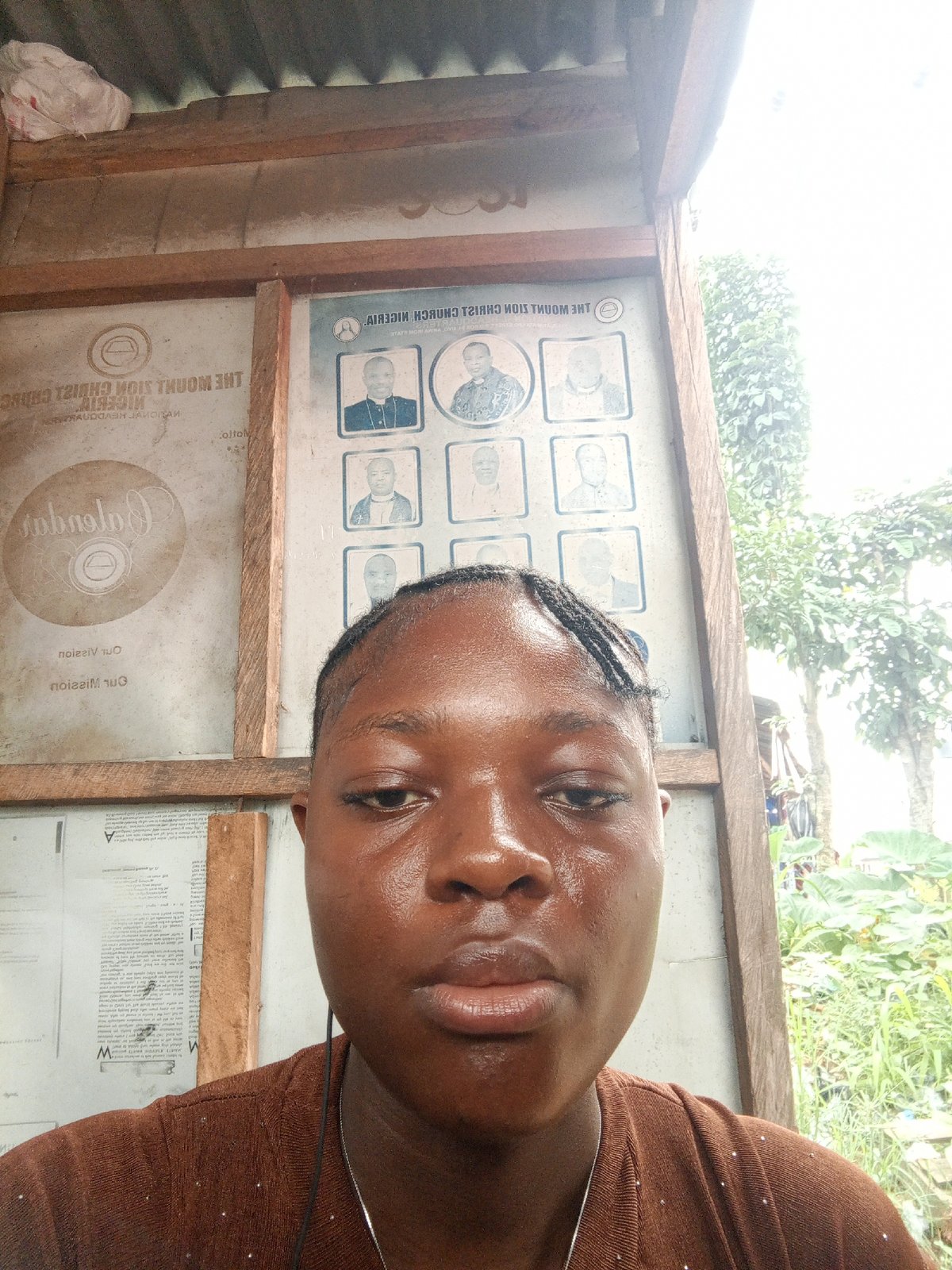 Woman takes multiple selfies at Nigerian church over morning hours