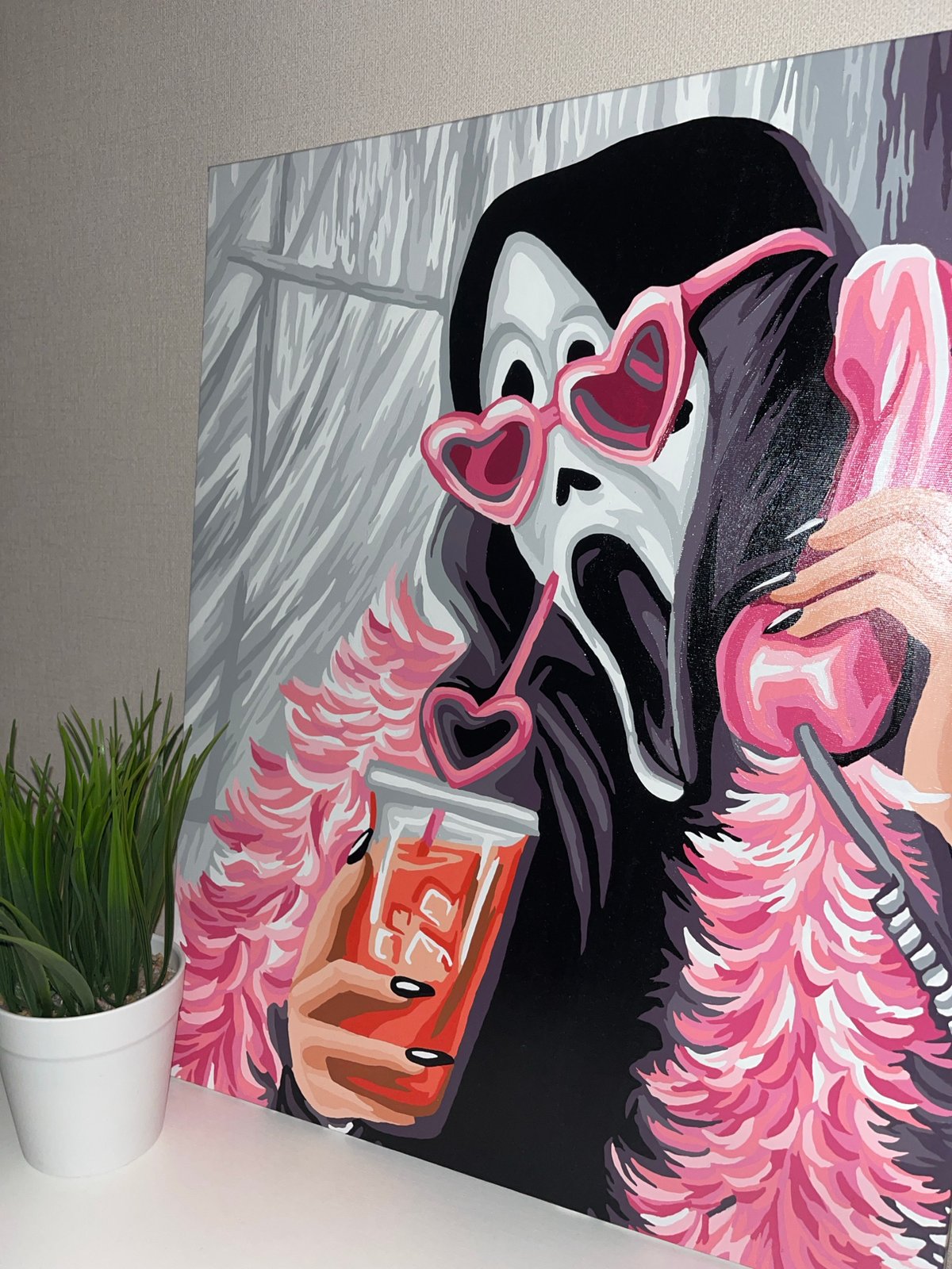 Person documents evening selfie session with artwork in Krasnodar