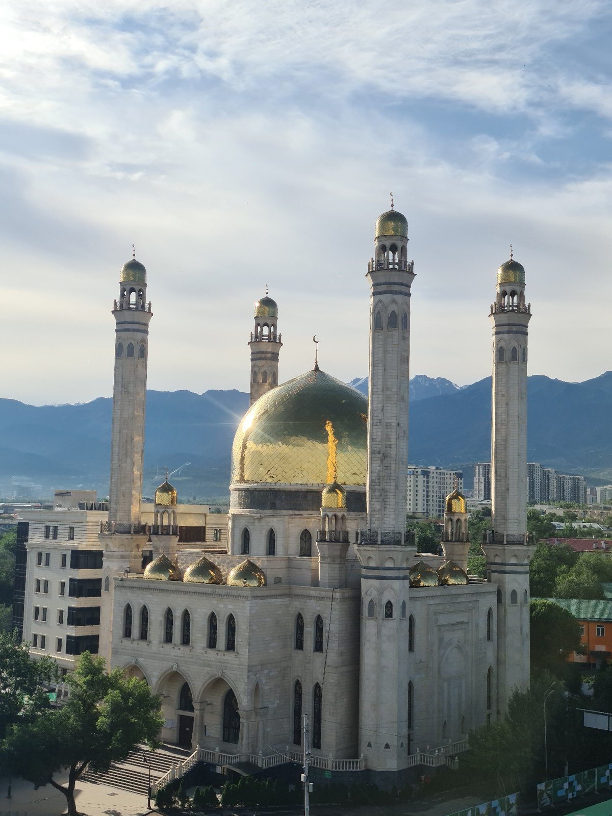 Almaty's Central Mosque seen from ground and aerial perspectives