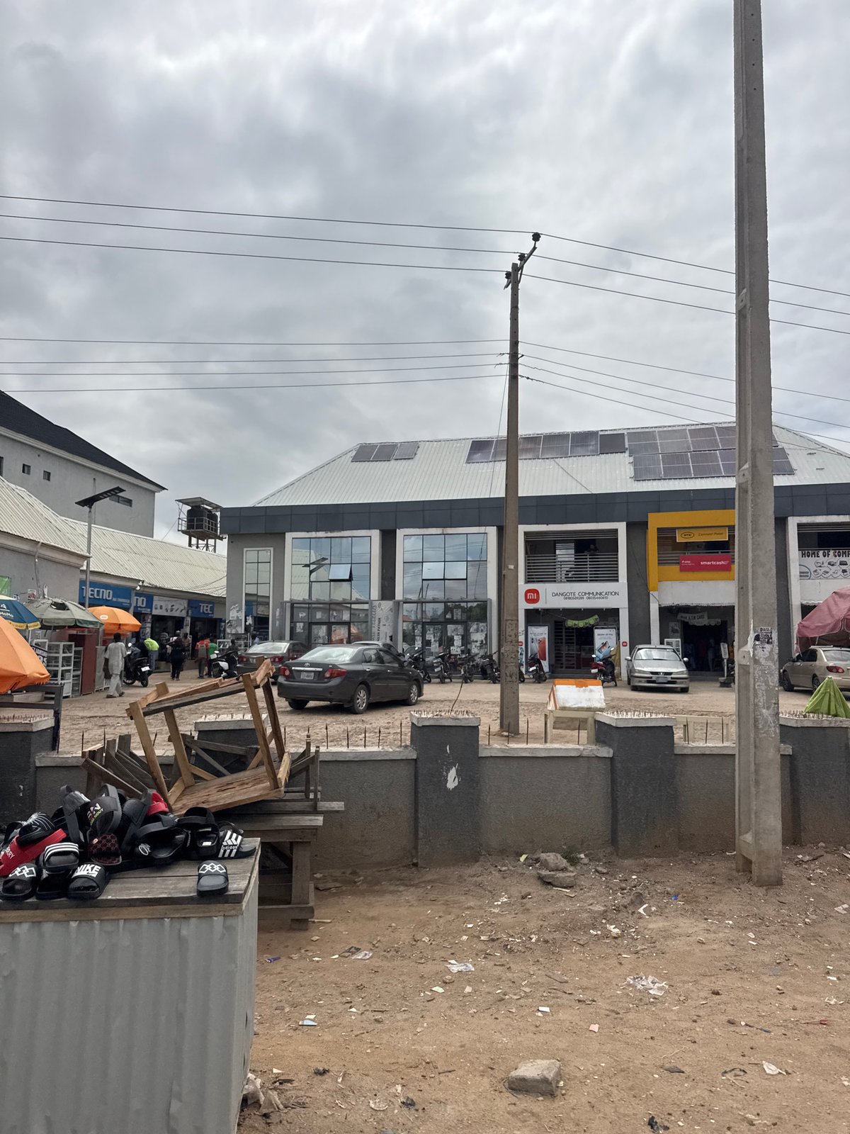 Phone shop browsing and street life in Jalingo, Nigeria