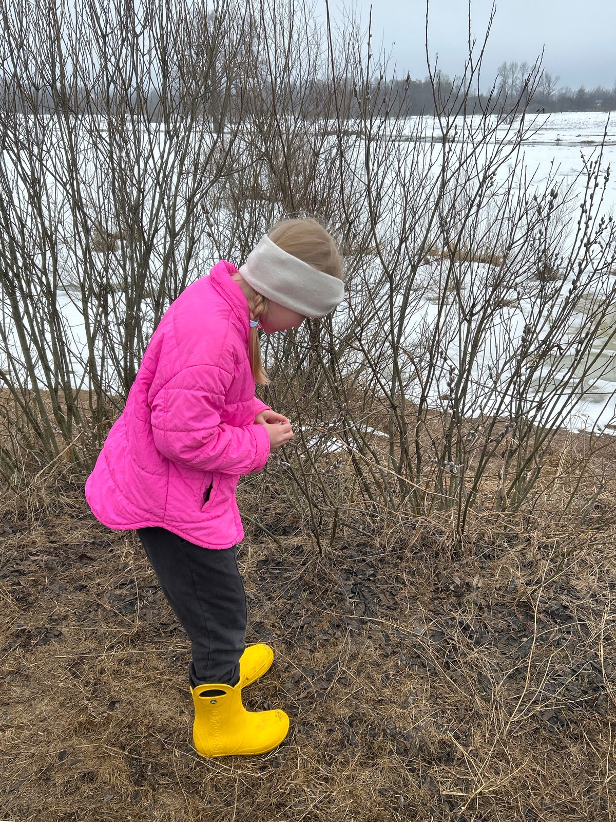 Child explores flood damage in rural Russian village
