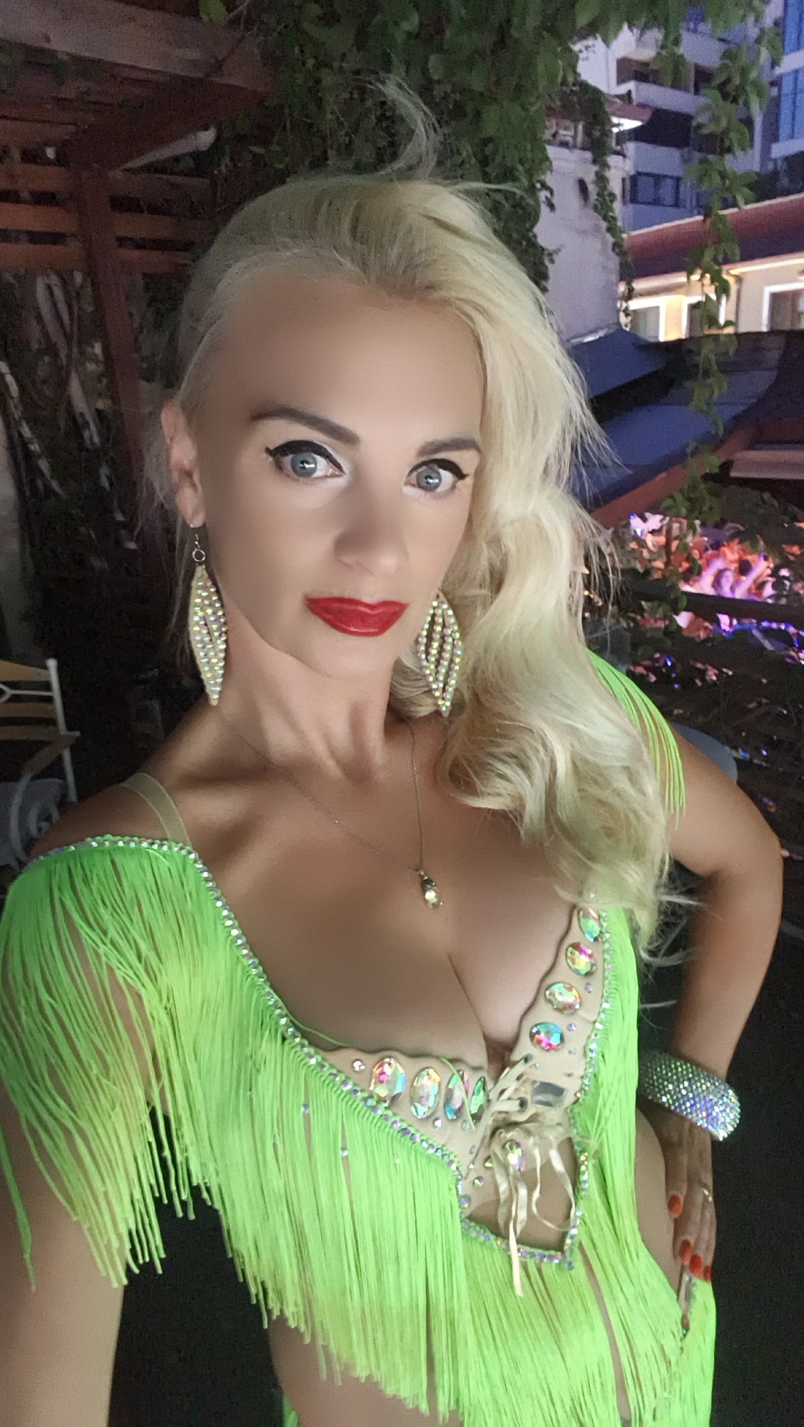 Kuşadası evening: glitzy costume selfie meets lit-up outdoor dining