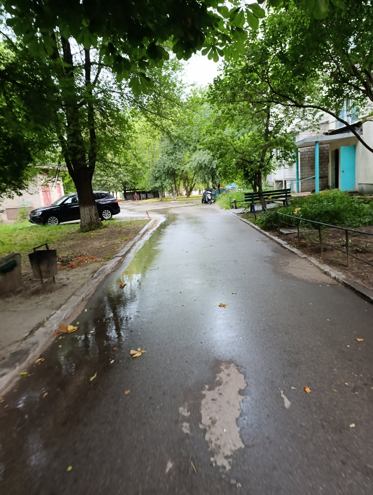 Rainy afternoon street-level look at Ladyzhyn, Ukraine