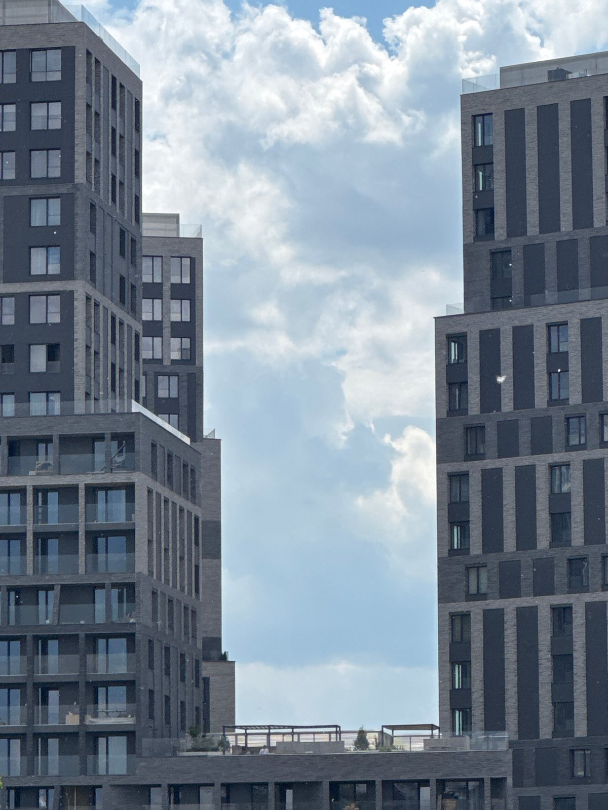 Moscow riverfront architecture documented in daylight urban scene