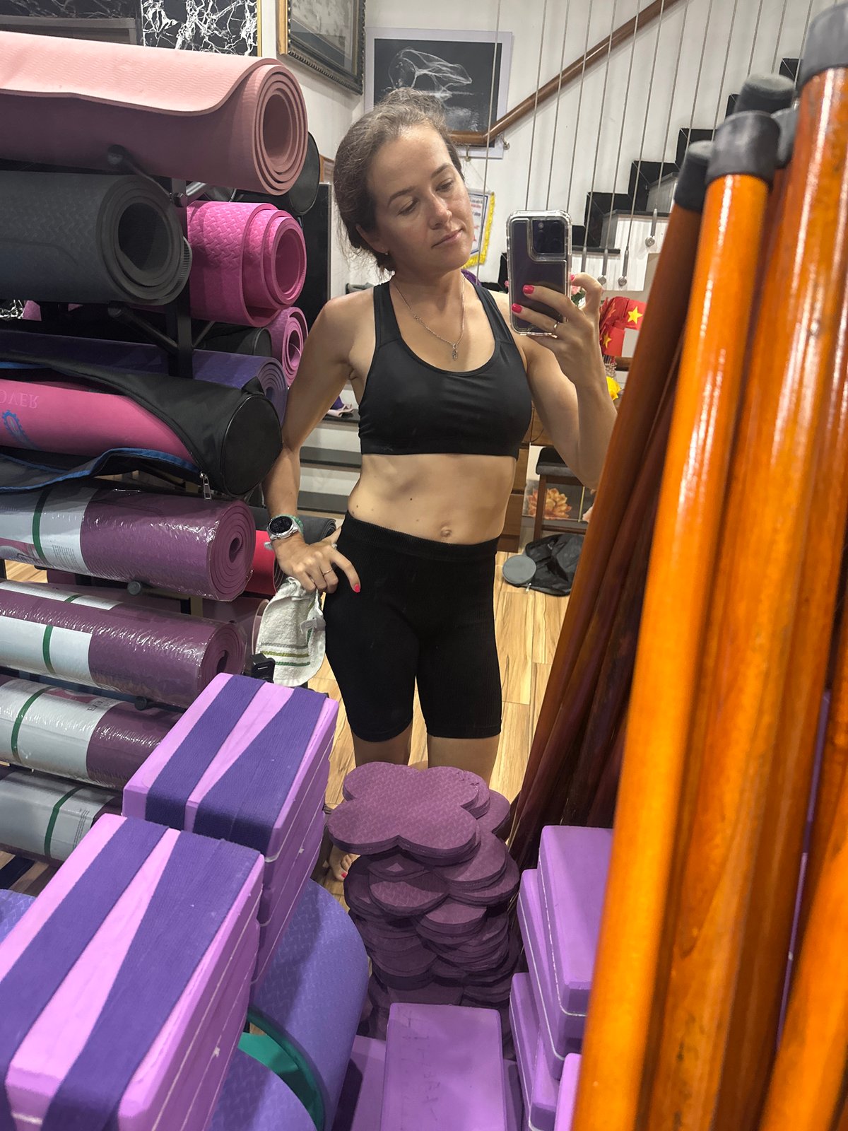 Woman takes selfies during yoga session in Vietnam studio
