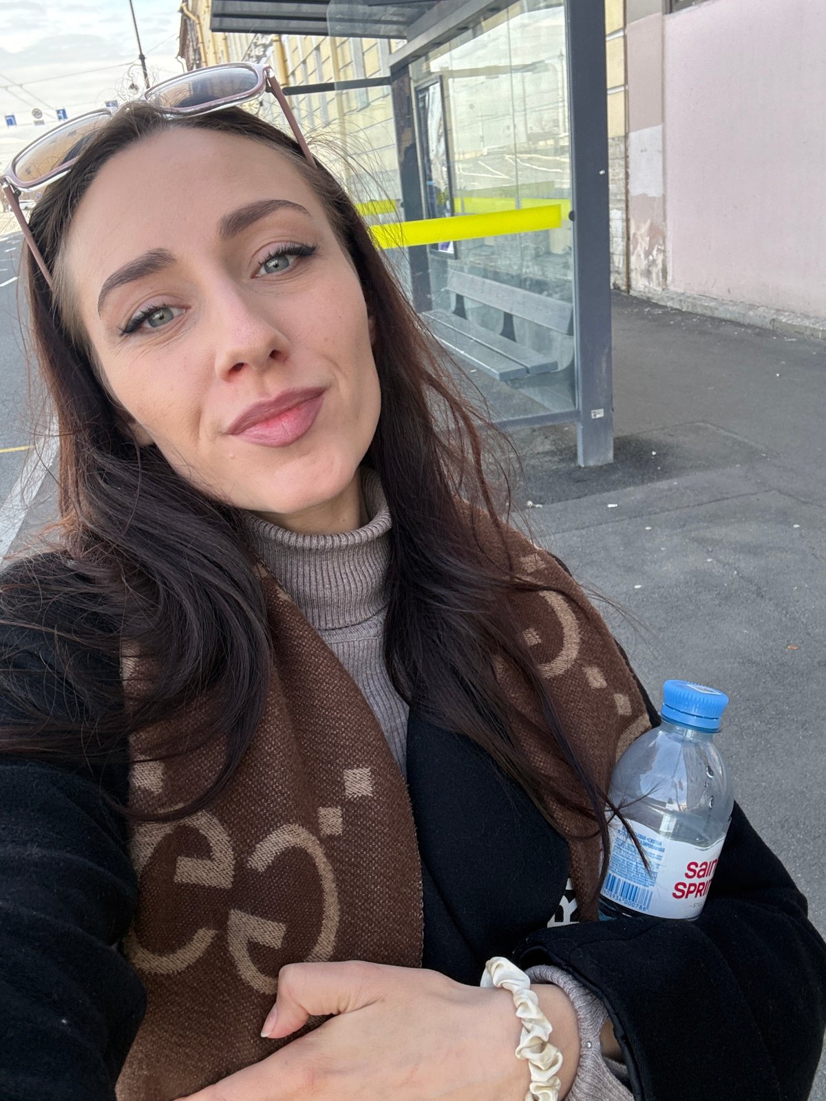 Woman takes selfie in Saint Petersburg urban area