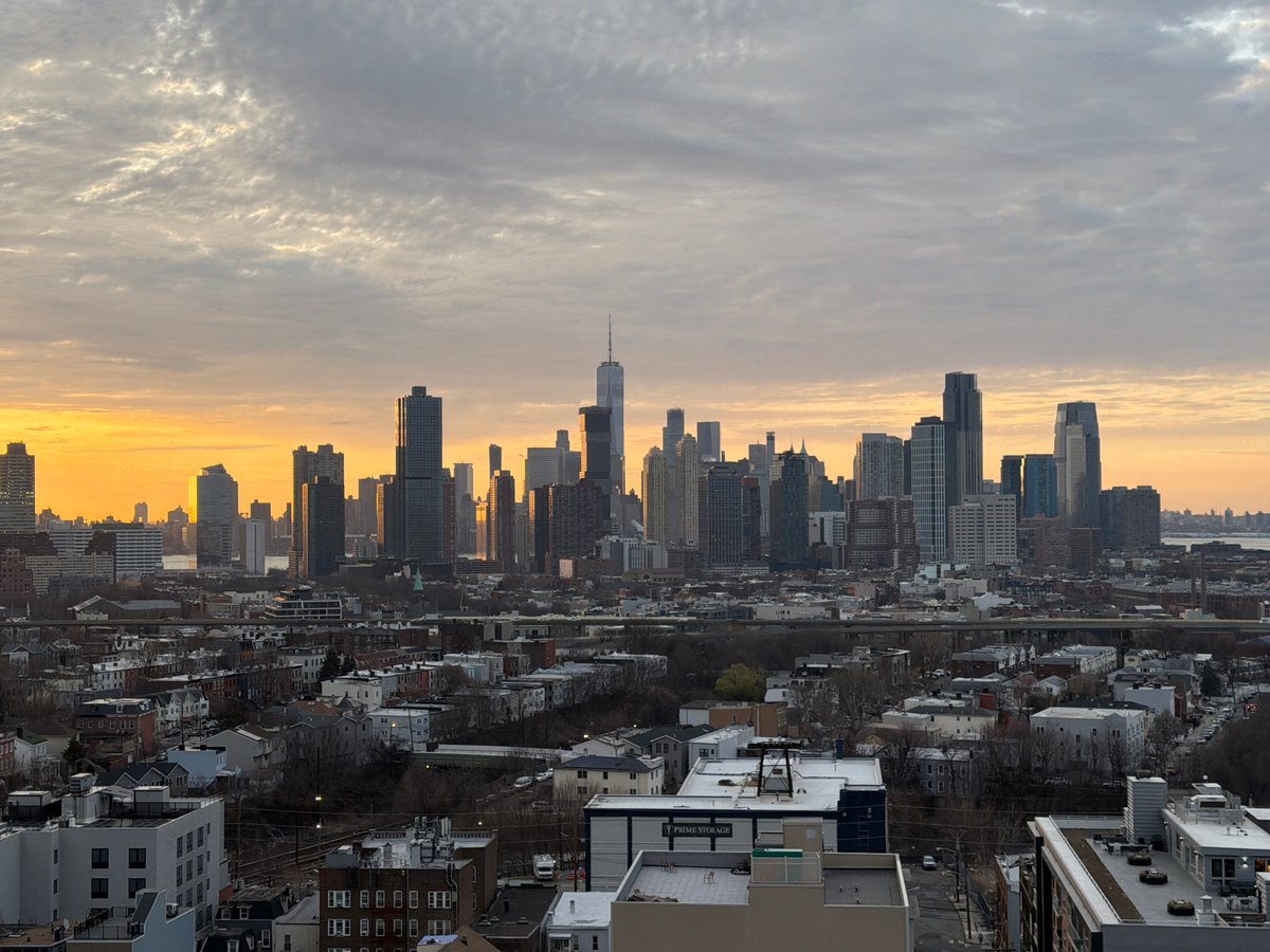 Jersey City skyline captured during overcast sunset
