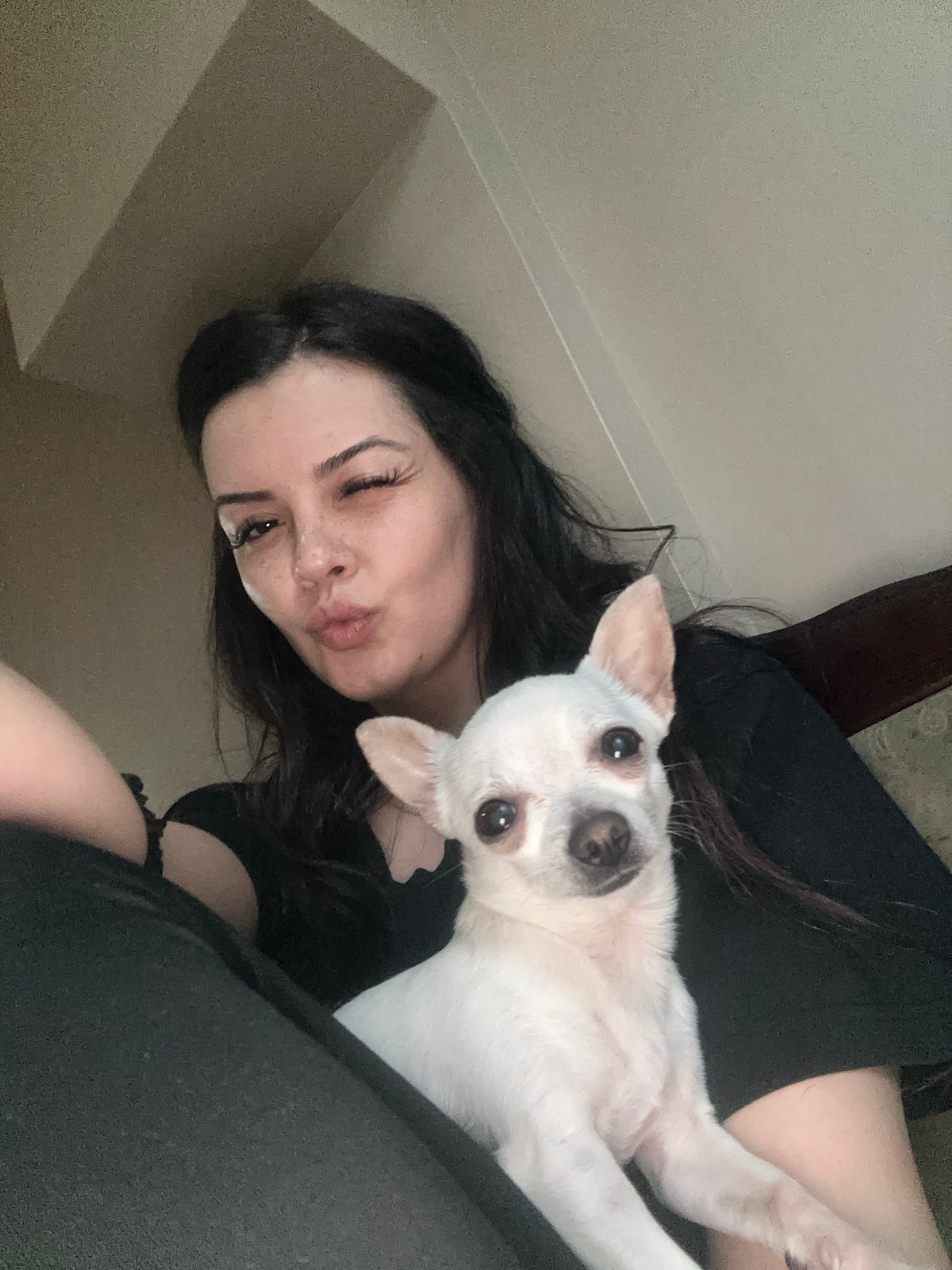 Woman shares leisurely afternoon with white dog in Bulgaria