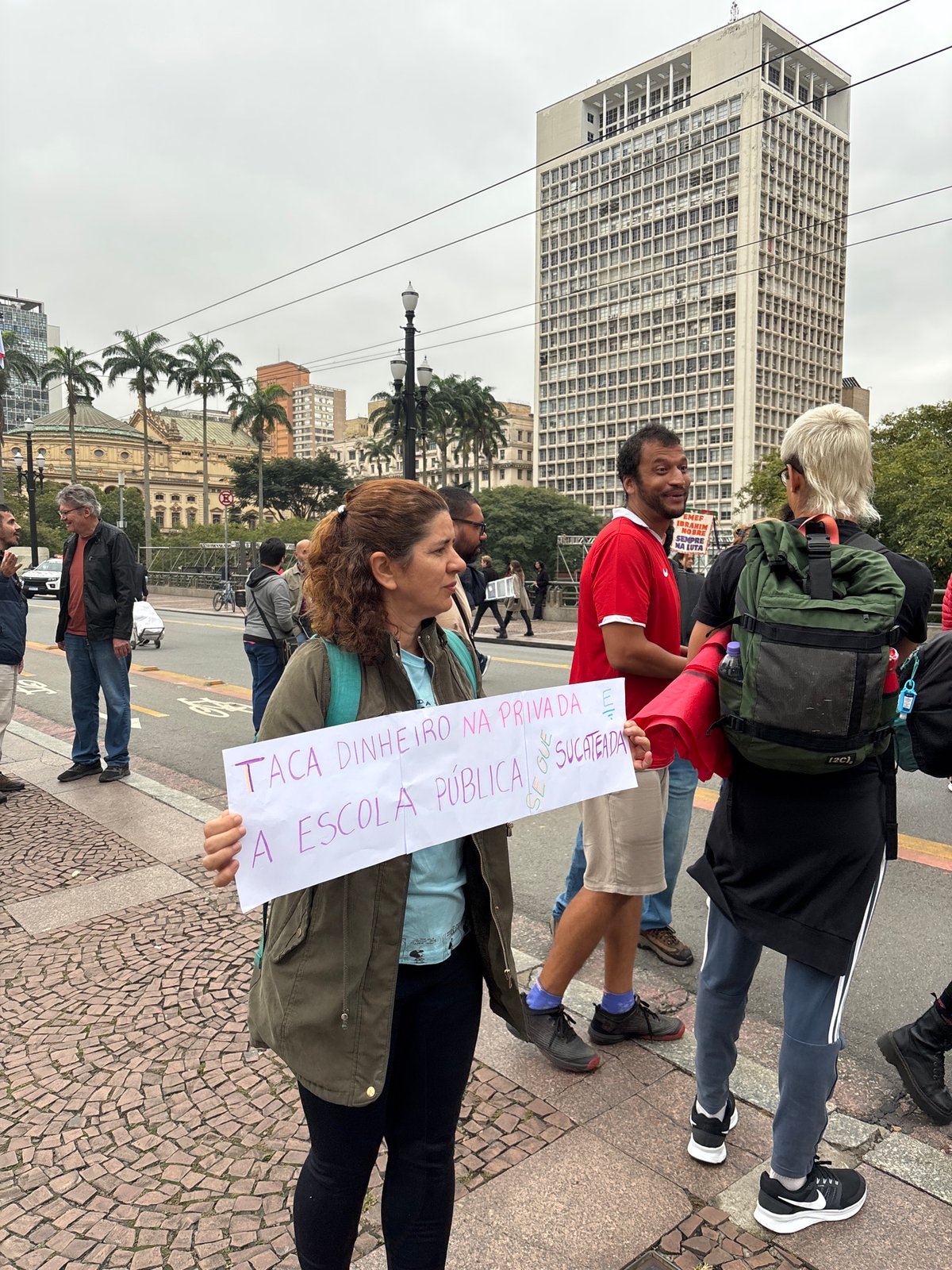 Woman protests education privatization in São Paulo demonstration